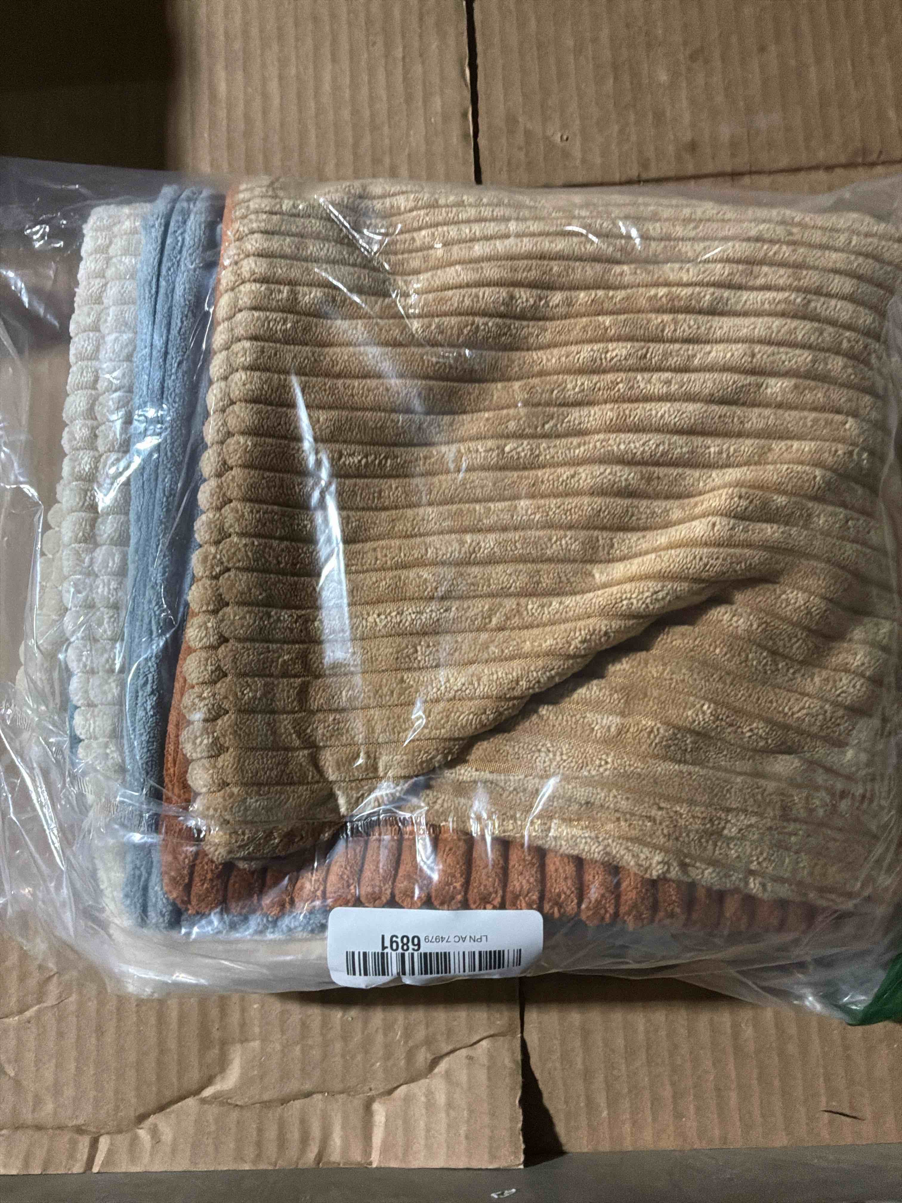 Condition photo showing New/Like New for LANANAS Neutral Couch Throw Pillow Covers 20x20 Inch Set of 4 Decorative Farmhouse Boho Throw Pillows for Living Room, Couch, Bed, Sofa Soft Corduroy Accent Home Decor (Neutral Brown, 20x20 Inch) 20" x 20" (Pack of 4) Neutral Cream-chocolate