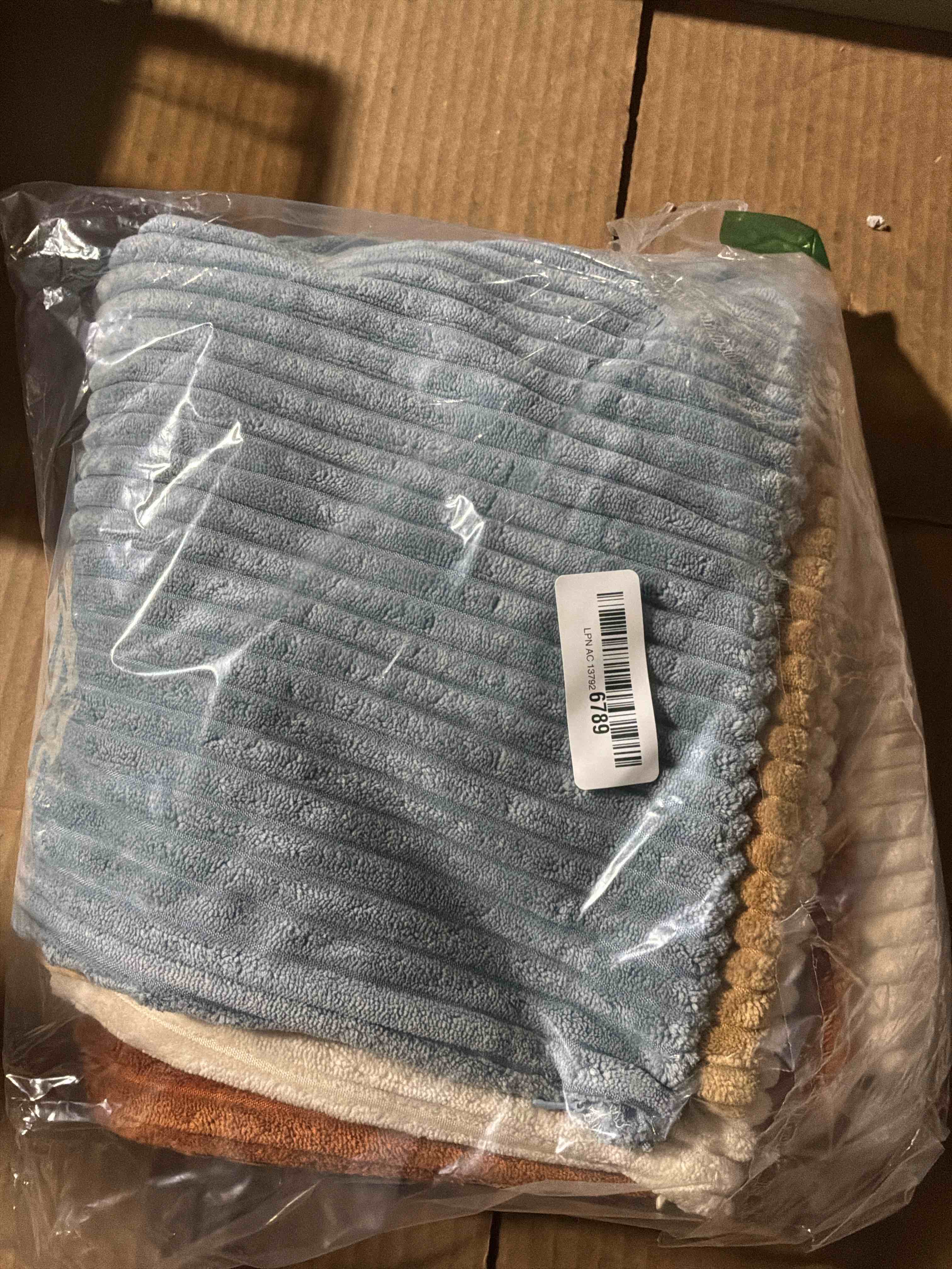 Condition photo showing New/Like New for LANANAS Neutral Couch Throw Pillow Covers 20x20 Inch Set of 4 Decorative Farmhouse Boho Throw Pillows for Living Room, Couch, Bed, Sofa Soft Corduroy Accent Home Decor (Neutral Brown, 20x20 Inch) 20" x 20" (Pack of 4) Neutral Cream-chocolate
