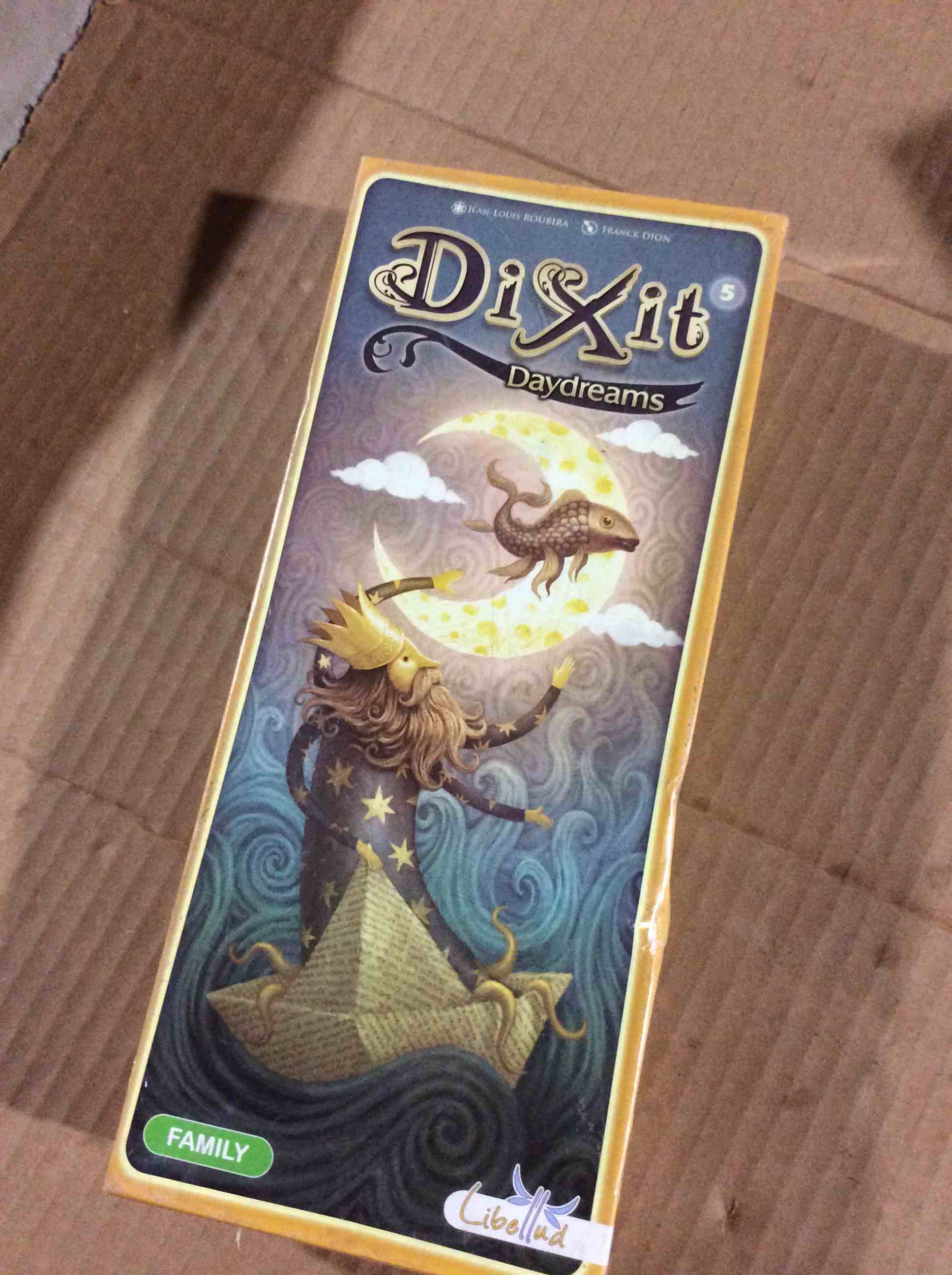 Condition photo showing New/Like New for Dixit Daydreams Board Game EXPANSION - Surreal Artistry with 84 Enigmatic Cards! Creative Storytelling Game, Family Game for Kids & Adults, Ages 8+, 3-6 Players, 30 Min Playtime, Made by Libellud