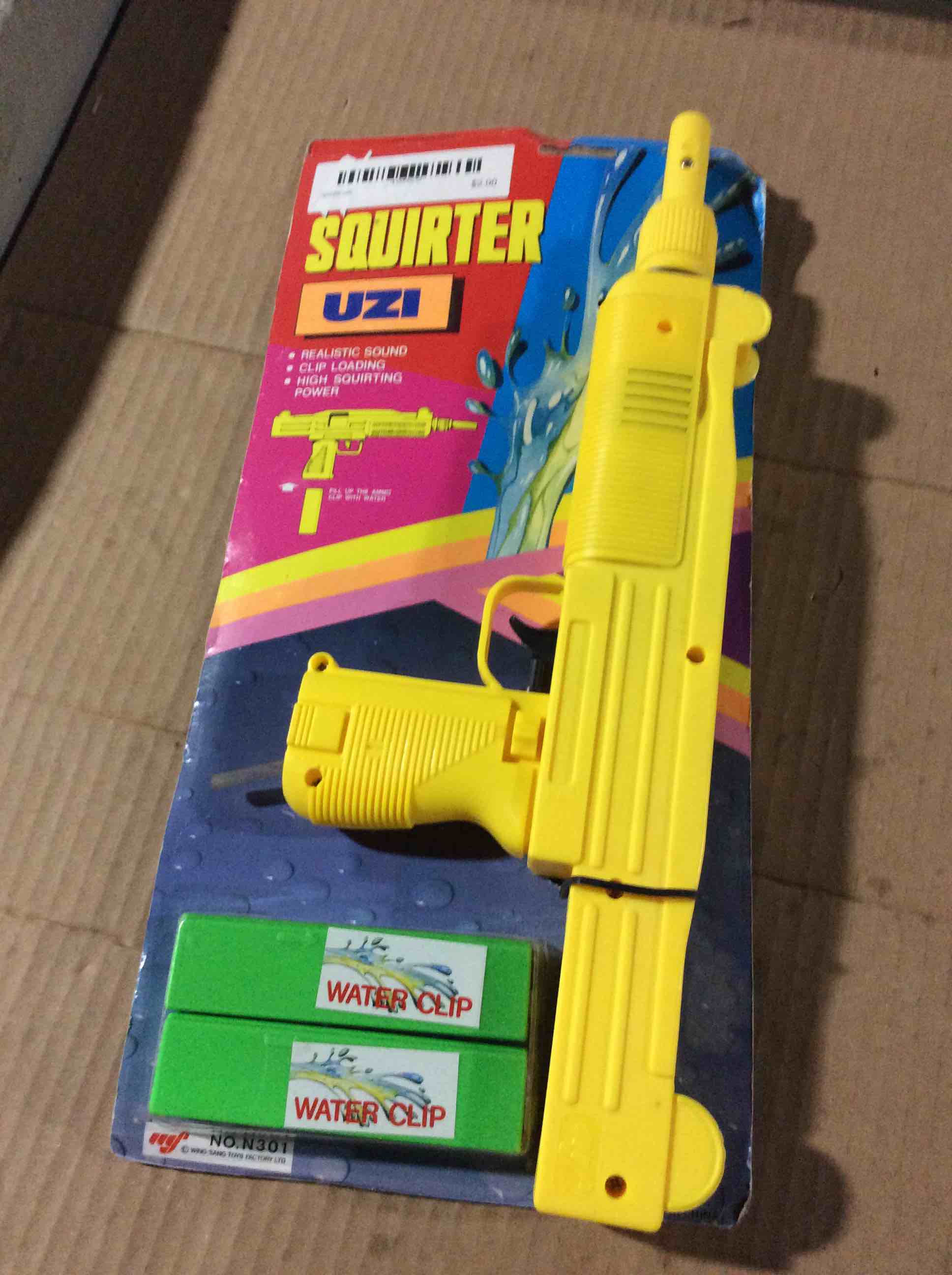 Condition photo showing New/Like New for vintage super soaker water gun Uzi sounds and water knock of rare neon