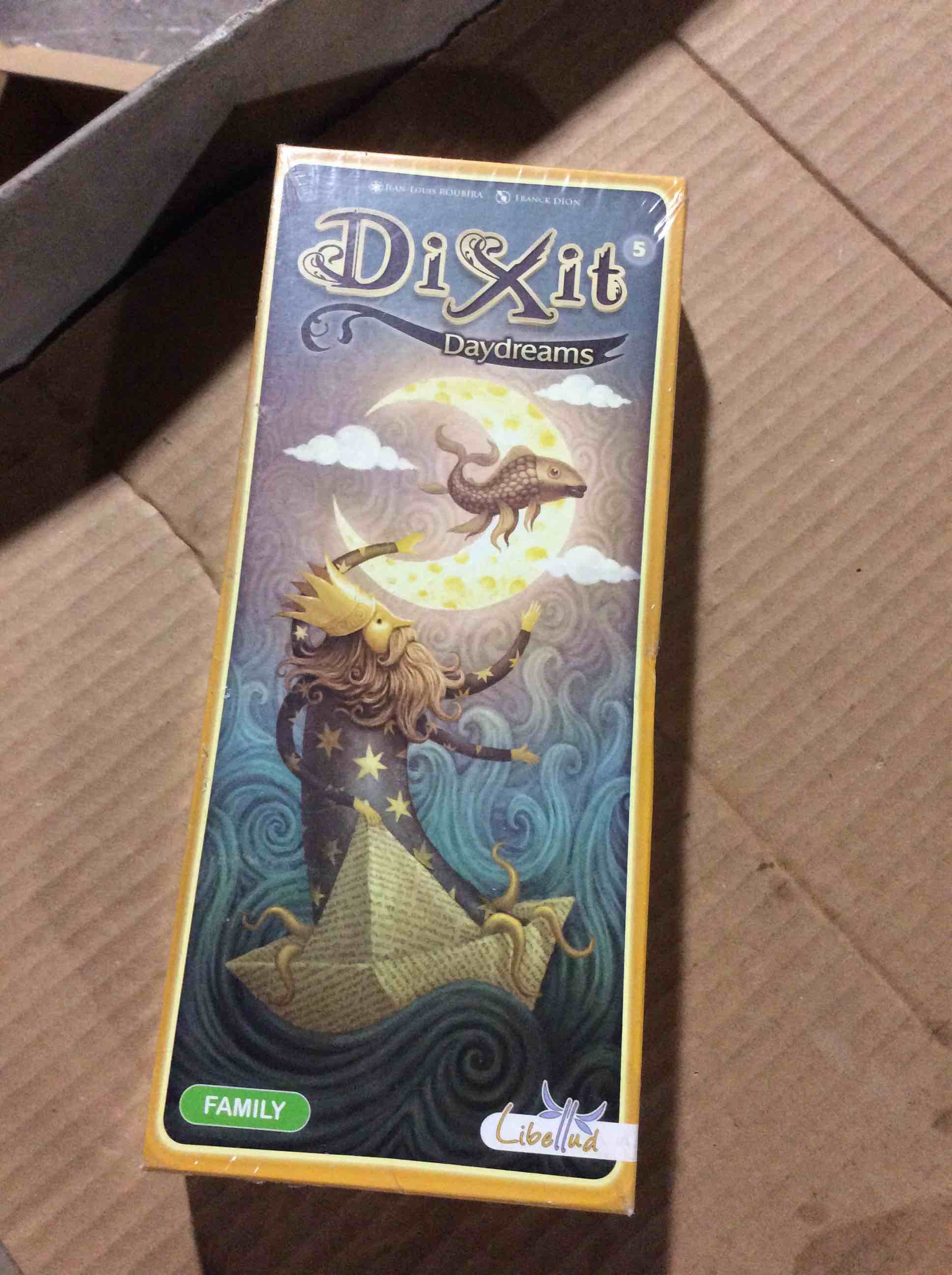 Condition photo showing New/Like New for Dixit Daydreams Board Game EXPANSION - Surreal Artistry with 84 Enigmatic Cards! Creative Storytelling Game, Family Game for Kids & Adults, Ages 8+, 3-6 Players, 30 Min Playtime, Made by Libellud