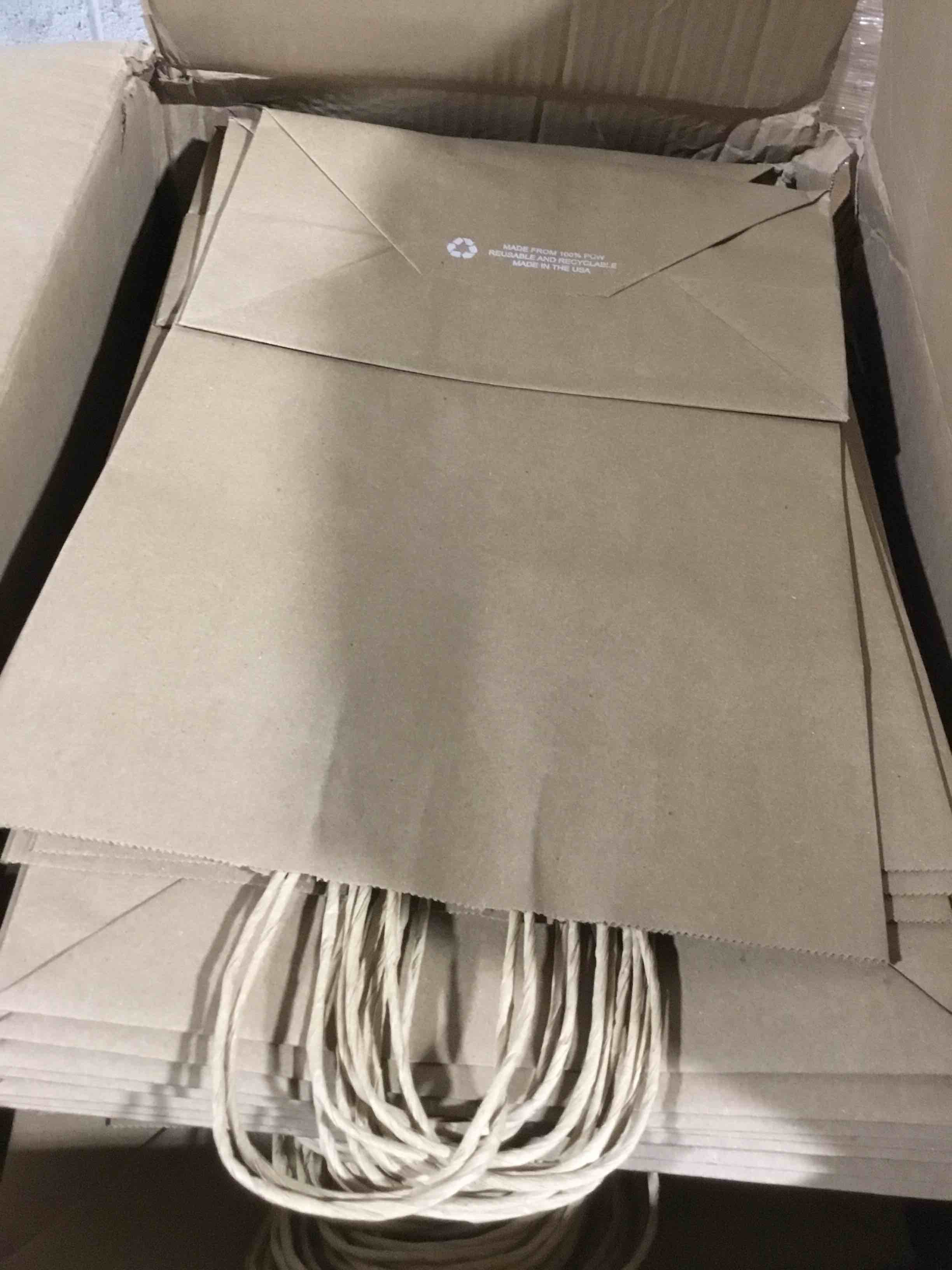 Condition photo showing Good Condition for OUTUXED 250 pcs Paper Bags with Handles, 5.25x3.2x8 Inches Brown Kraft Gift Bags Bulk for Christmas, Shopping, Birthday, Wedding and Business Party