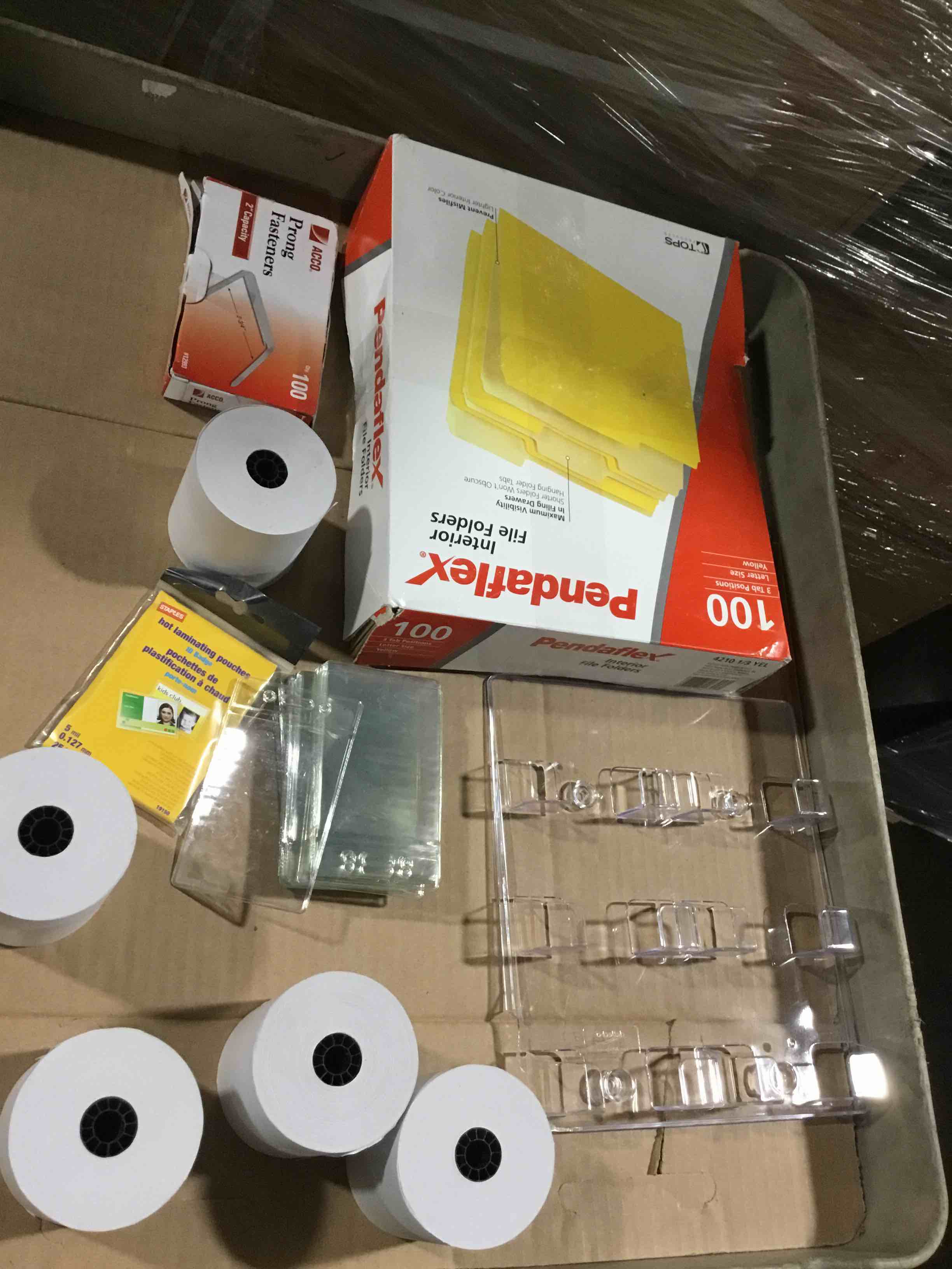 box of assorted office products 