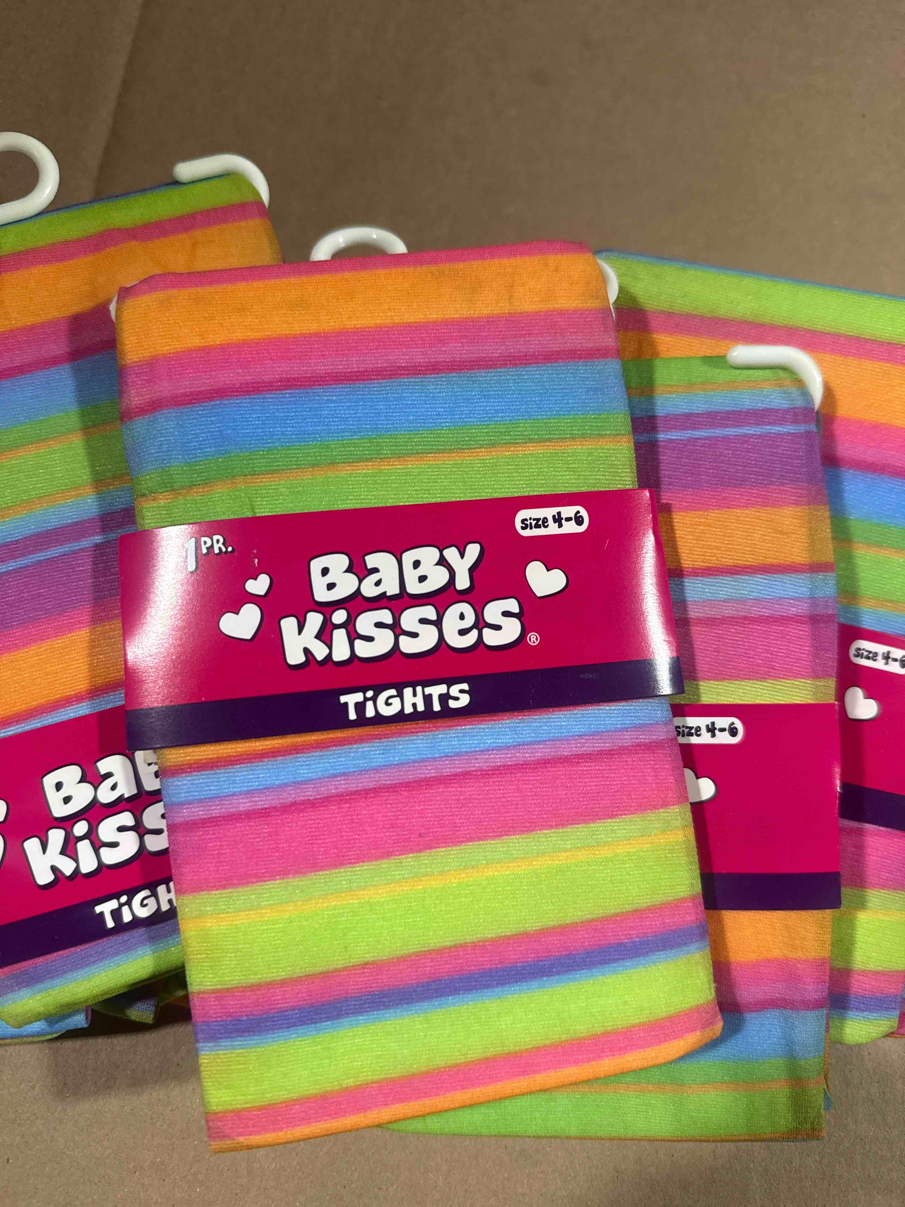 case of 9 size 4-6 baby kisses tights 