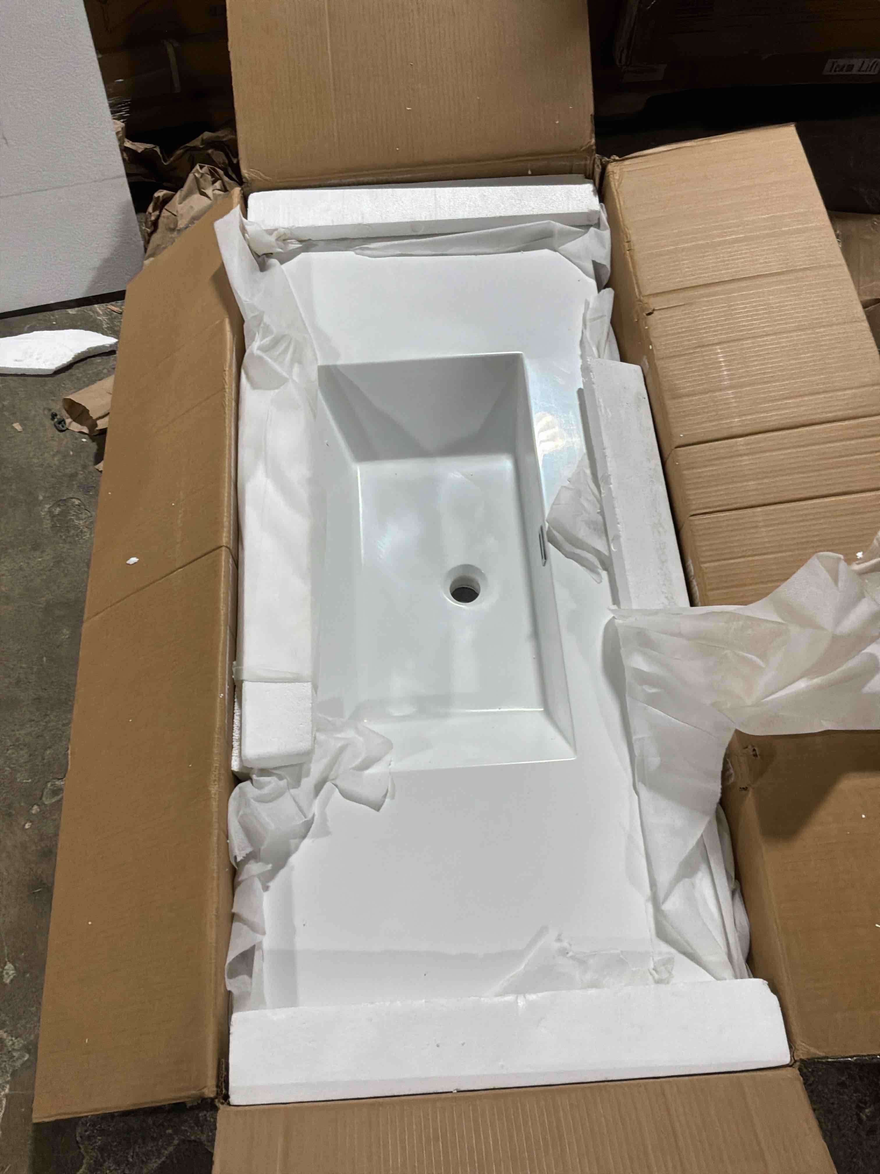 Condition photo showing New/Like New for 36 in. w x 22 in. d solid surface white rectangular single sink bathroom vanity top for with a 4 in. hight backsplash