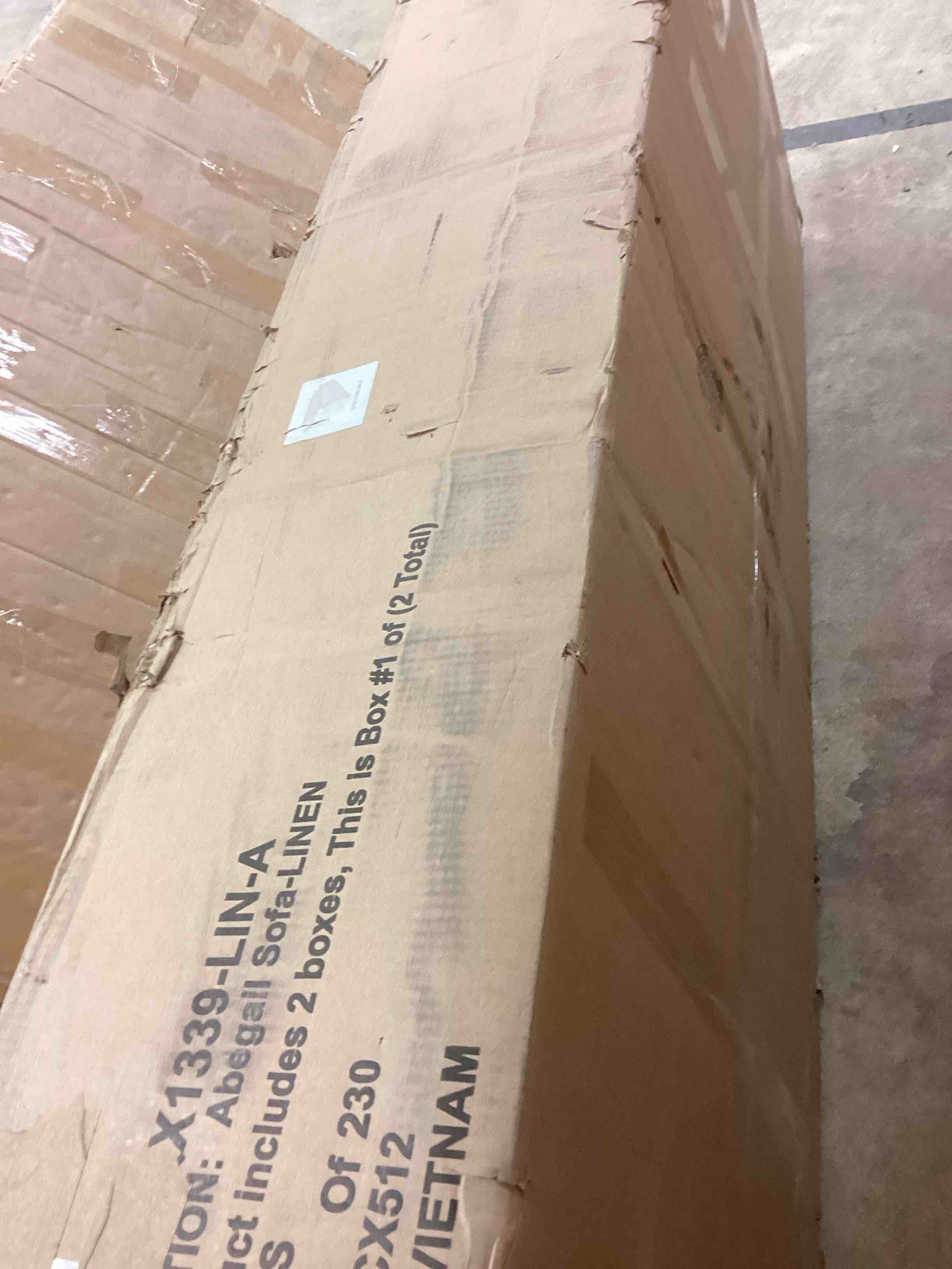 Condition photo showing Good Condition for abegail sofa-linen (incomplete one box of two only)