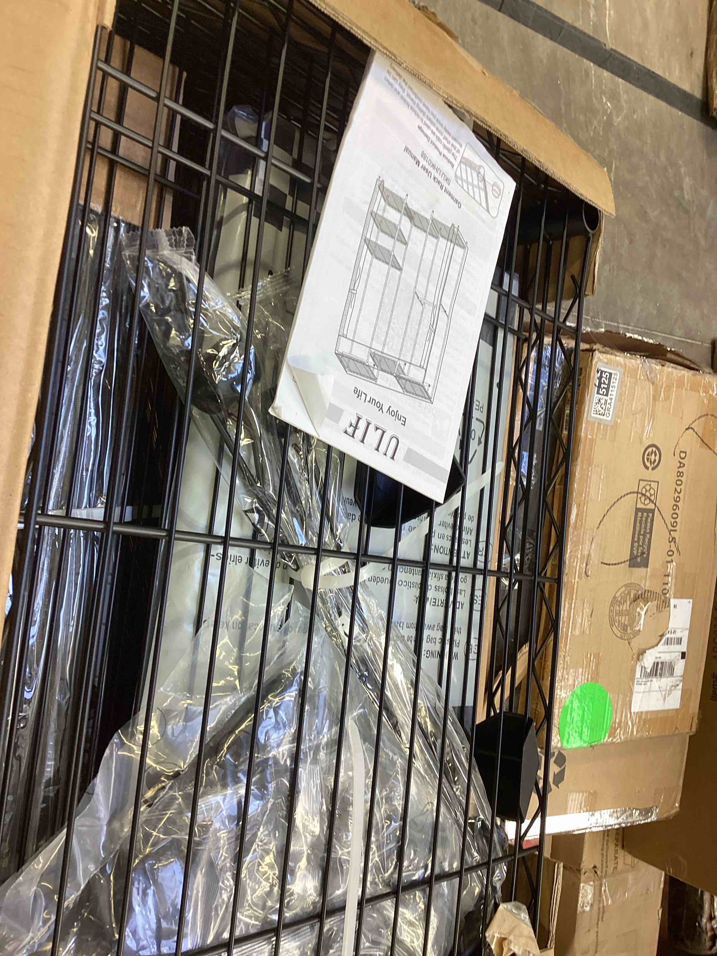 Condition photo showing New/Like New for heavy-duty garment rack, metal freestanding