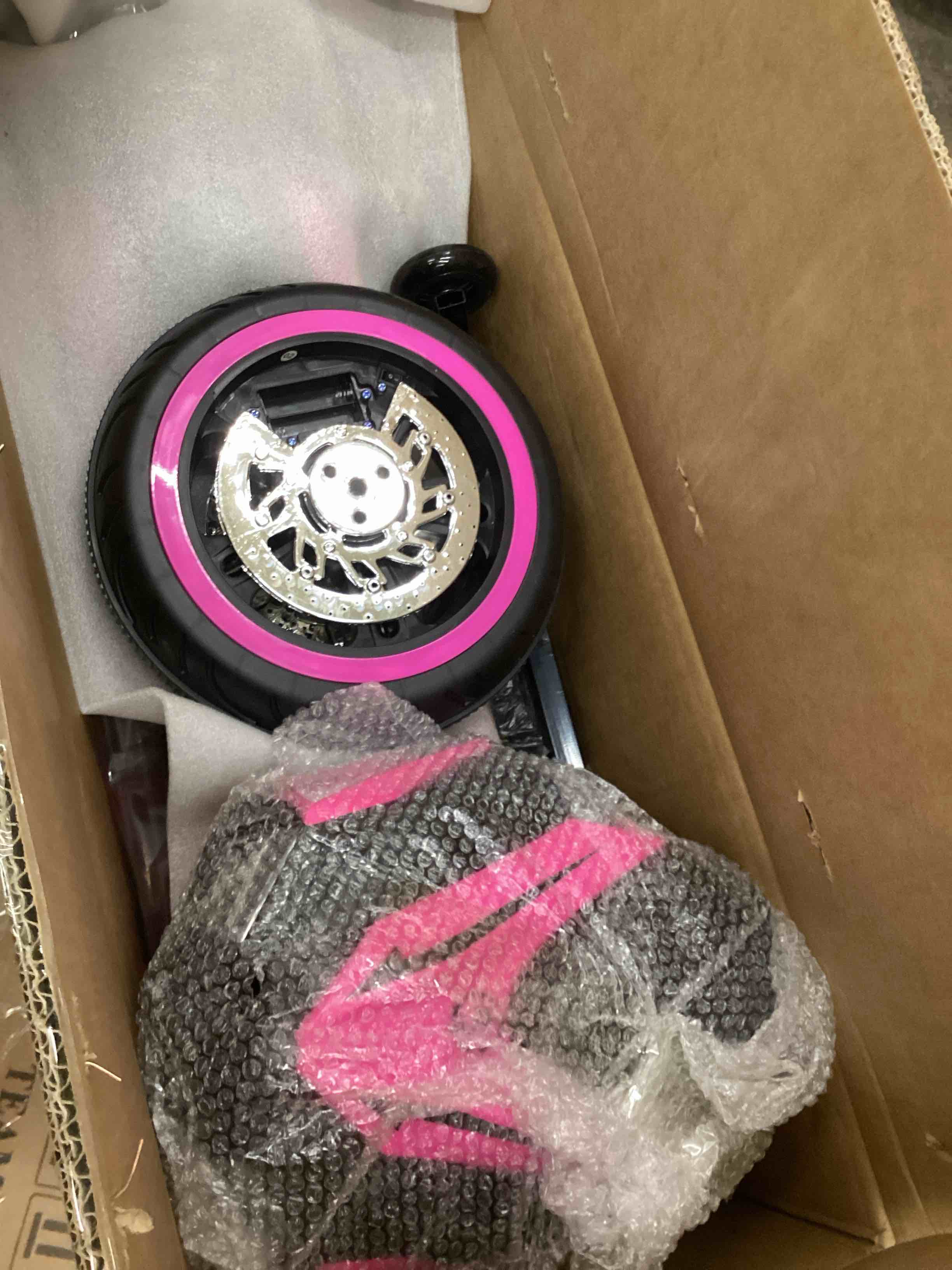 Condition photo showing New/Like New for kids electric motorcycle with training wheels/light wheels/speed by hand, music function (pink)