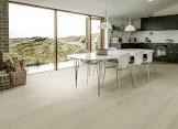 vinyl Flooring color see picture for color  ( bide per sq ft ) ( boxes for pick up )