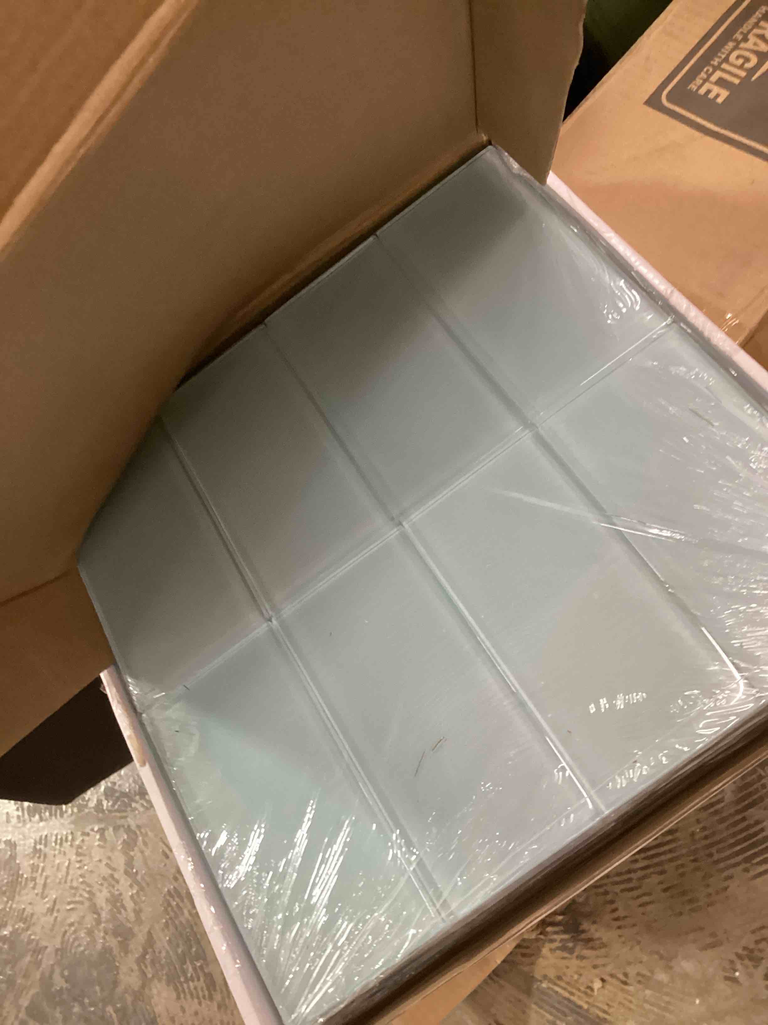 Condition photo showing New/Like New for giorbello baby blue 3 in. x 6 in. x 8 mm glass subway wall tile 5 sheets(5 sq. ft./case)