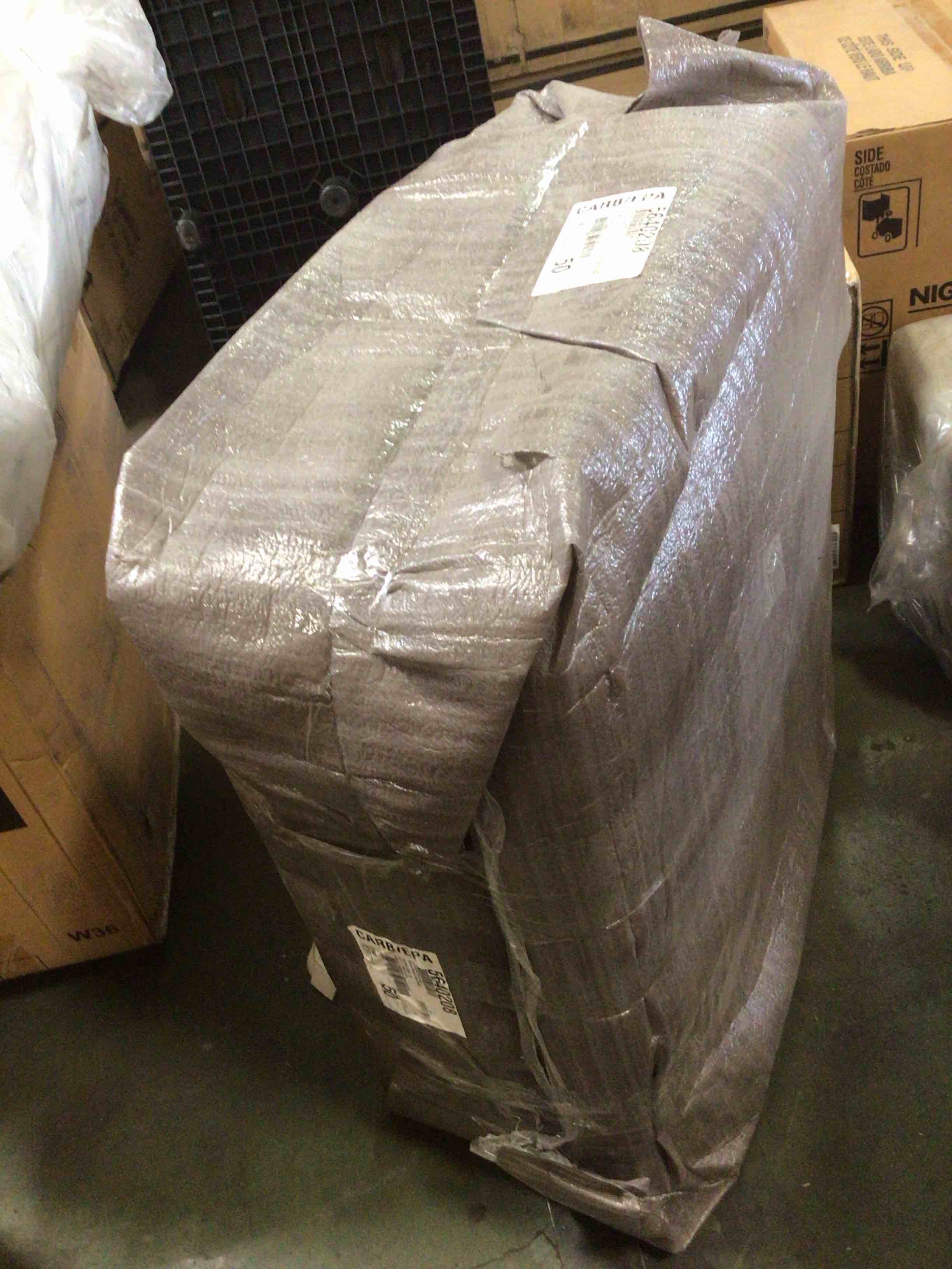 Condition photo showing New/Like New for ashley furniture hoylake fabric ottoman in chocolate