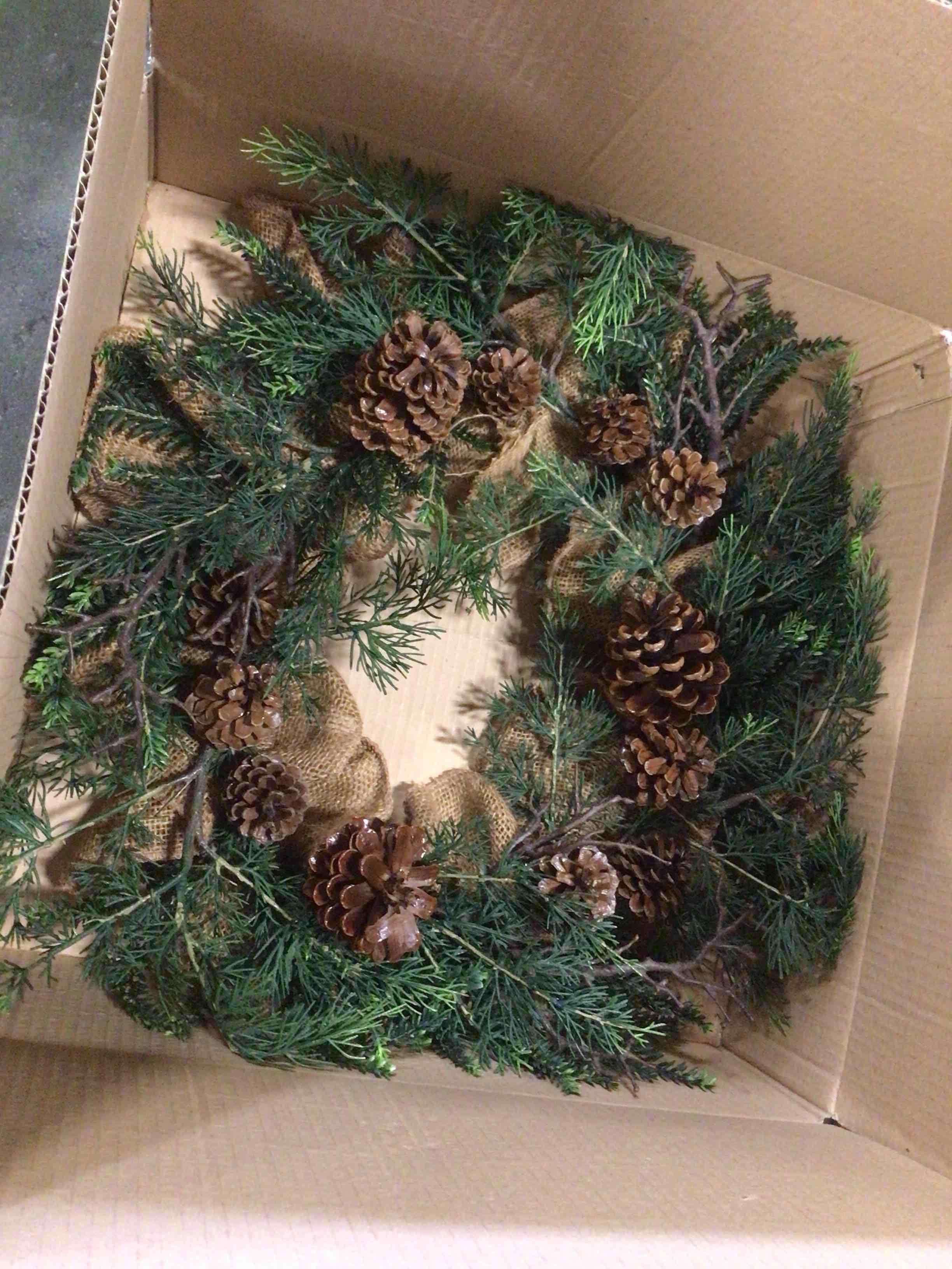 Condition photo showing New/Like New for ( similarly)22” evergreen whit  pinecones and burlap ribbon wreath