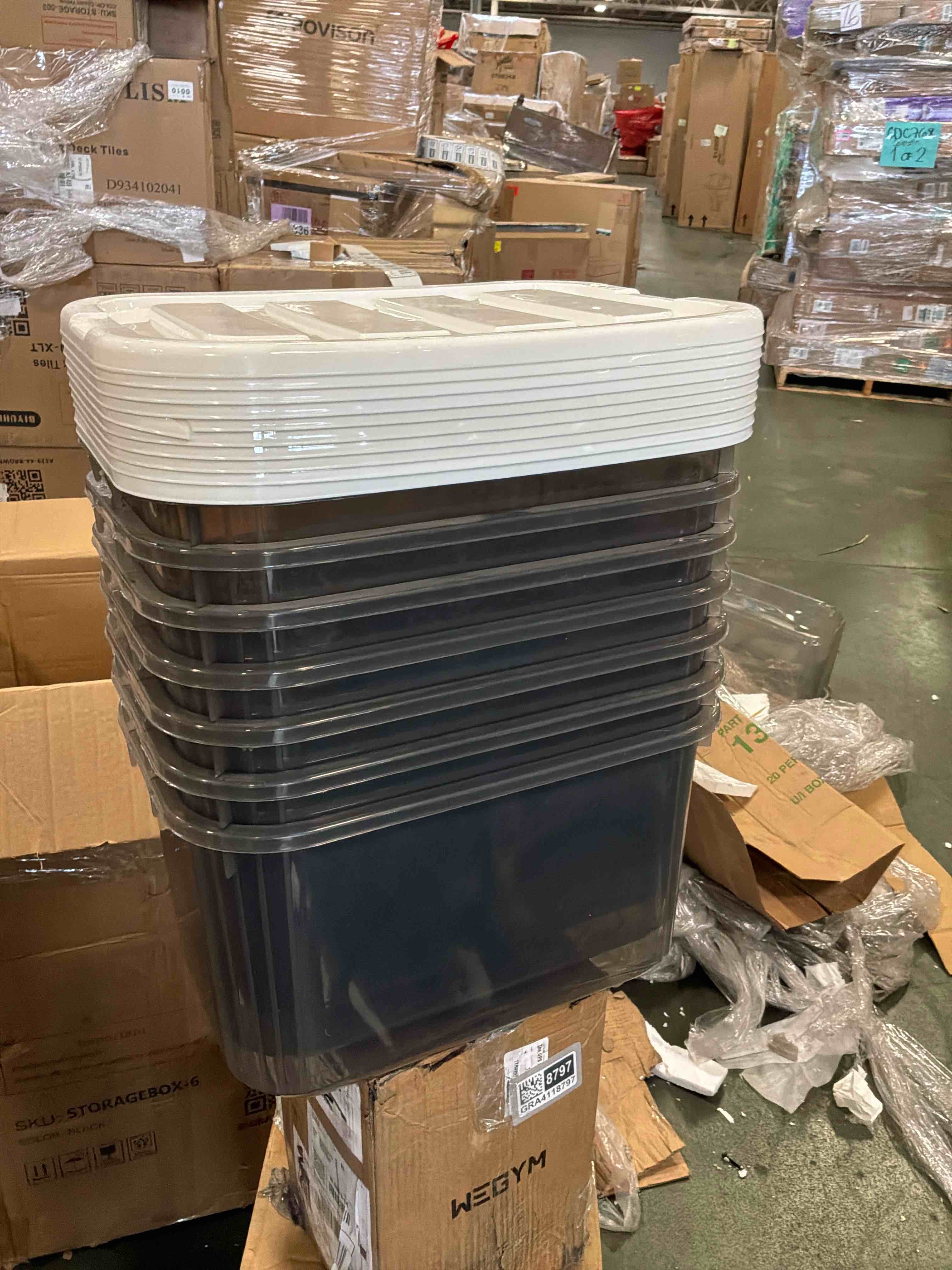 Condition photo showing Good Condition for 6 plastic storage boxes, small clear box with grey lid