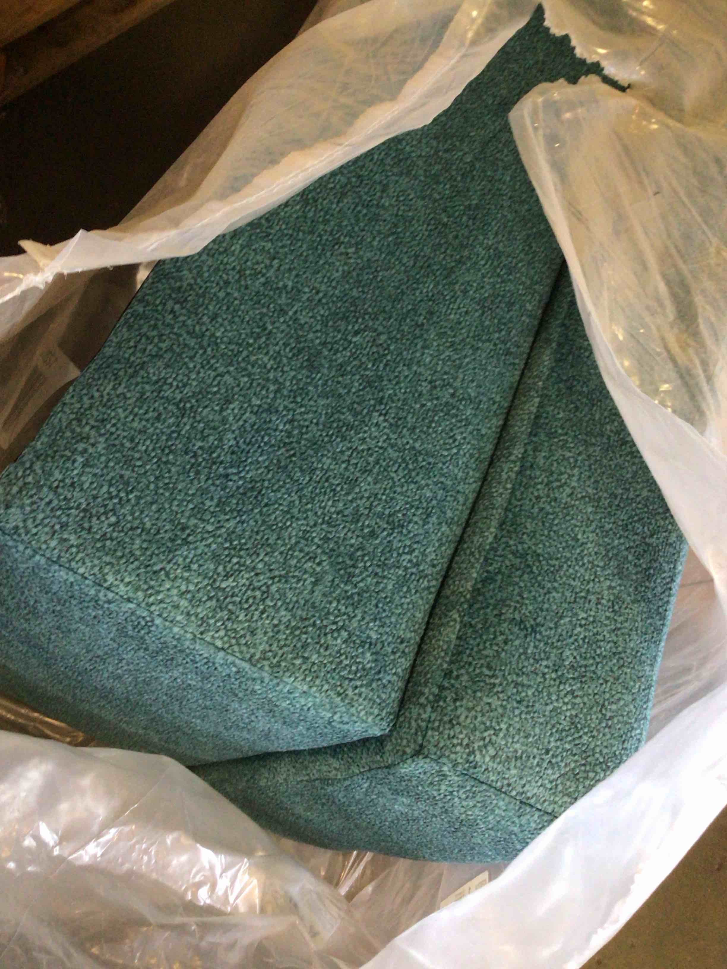 6750714 Ashley Furniture Keerwick - Teal Ottoman