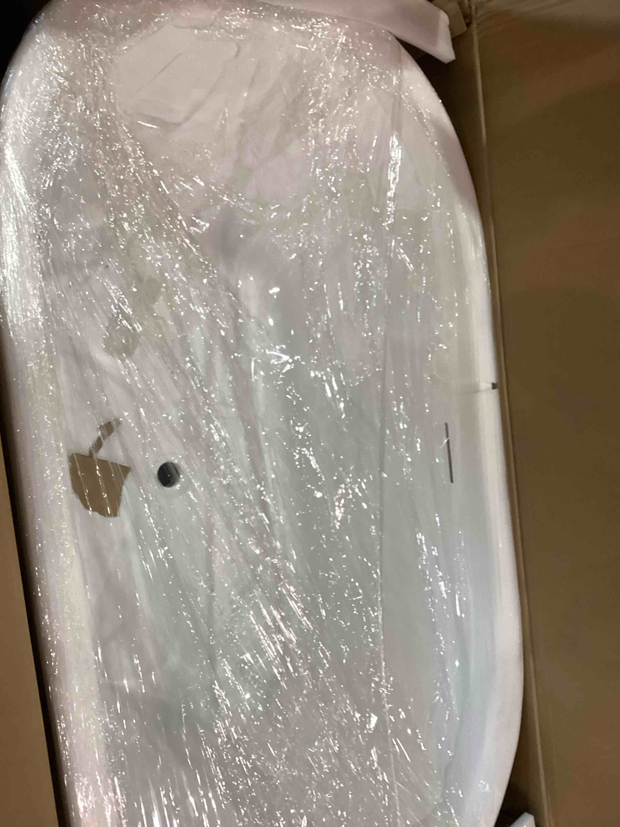 Condition photo showing As Is for 59” free standing tub
