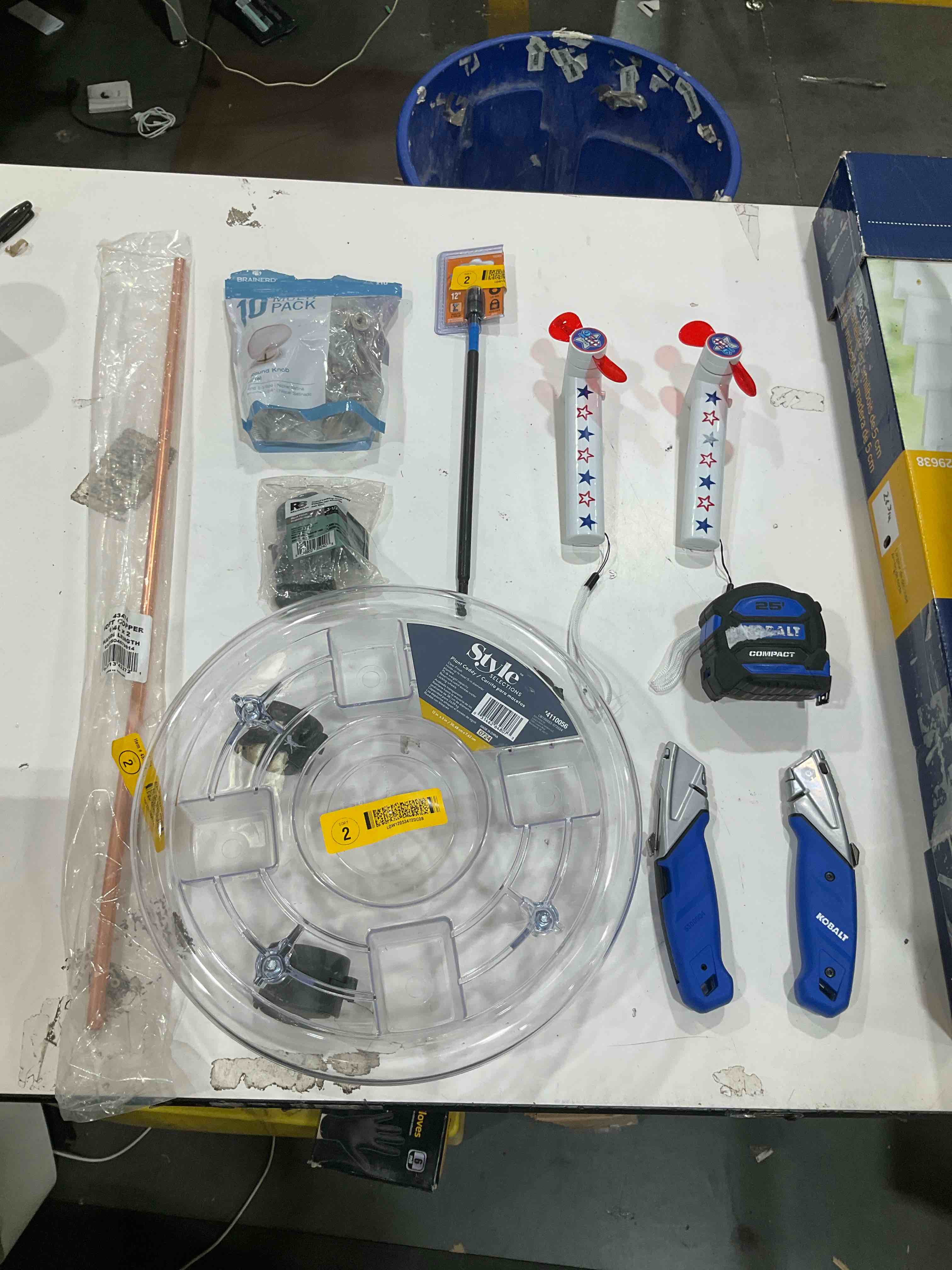 Condition photo showing As Is for assorted home improvement lot (small tools, screw, home accessories, etc.)