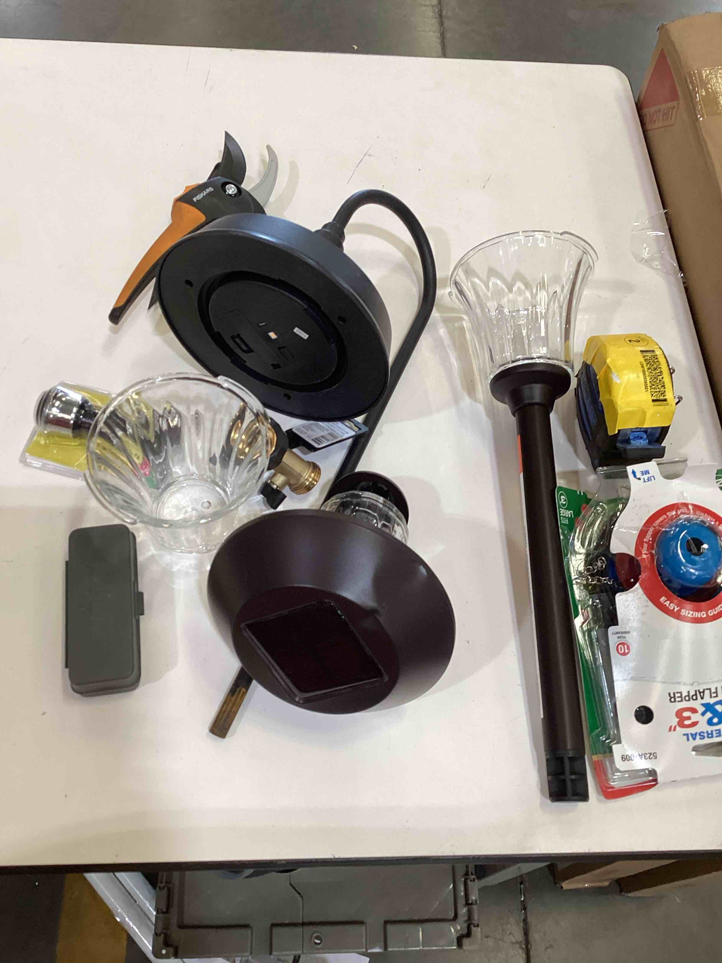 Condition photo showing As Is for assorted home improvement lot (small tools, screw, home accessories, etc.)