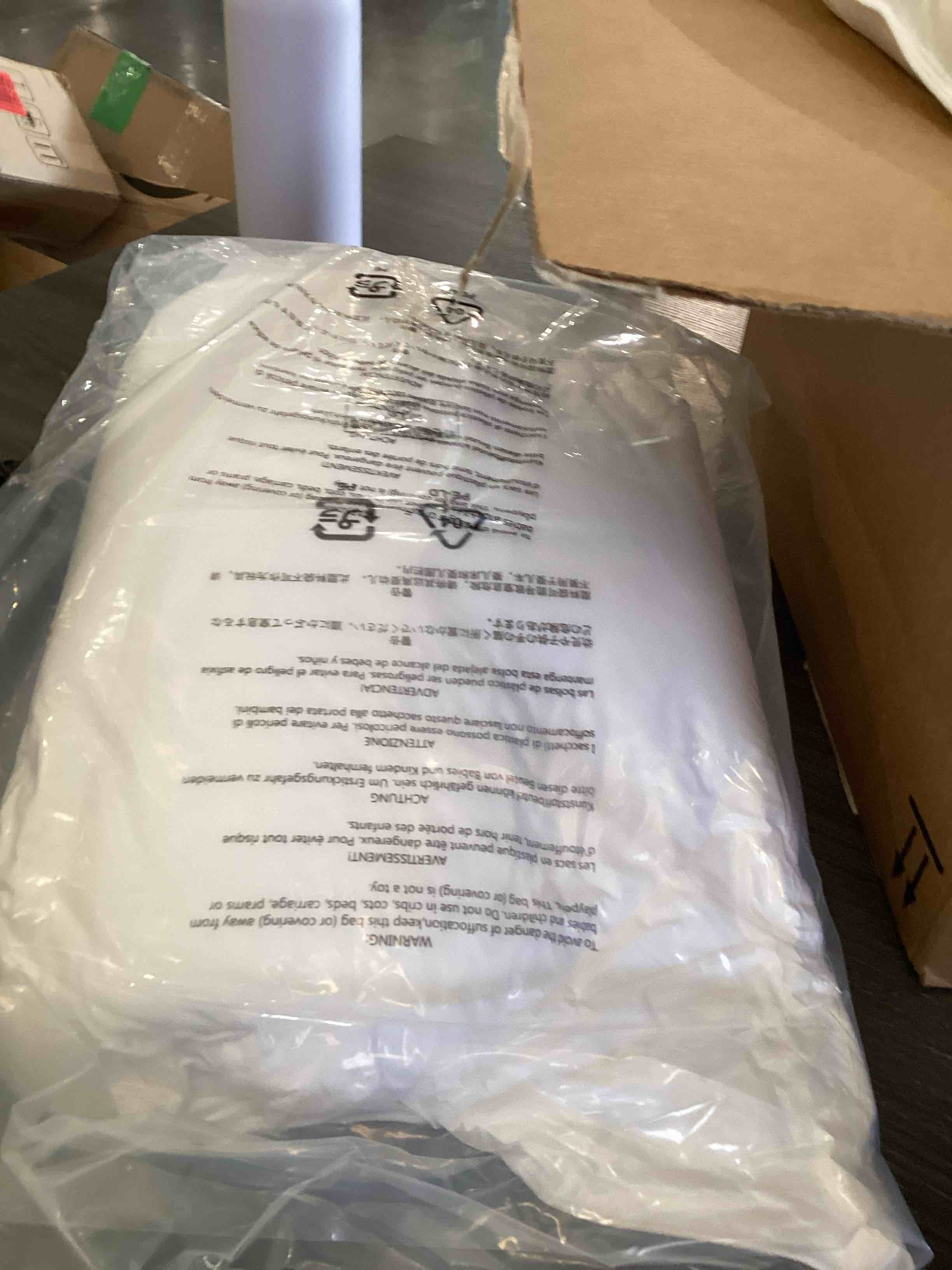 Condition photo showing As Is for 2 pillows white 