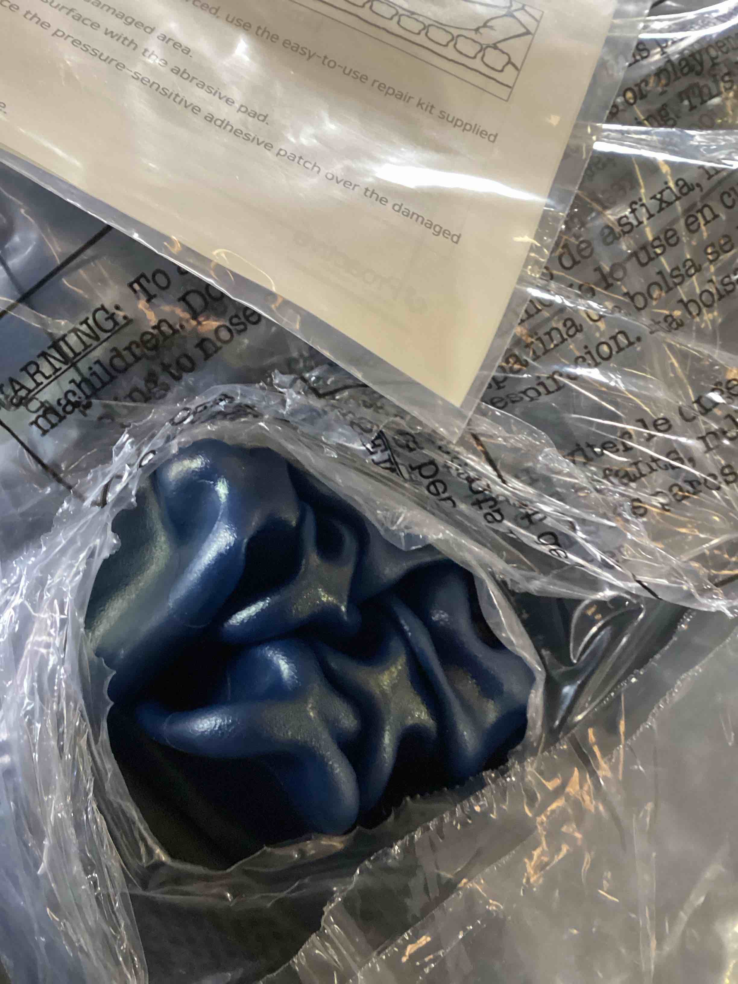 Condition photo showing As Is for inflatable seat cushion 