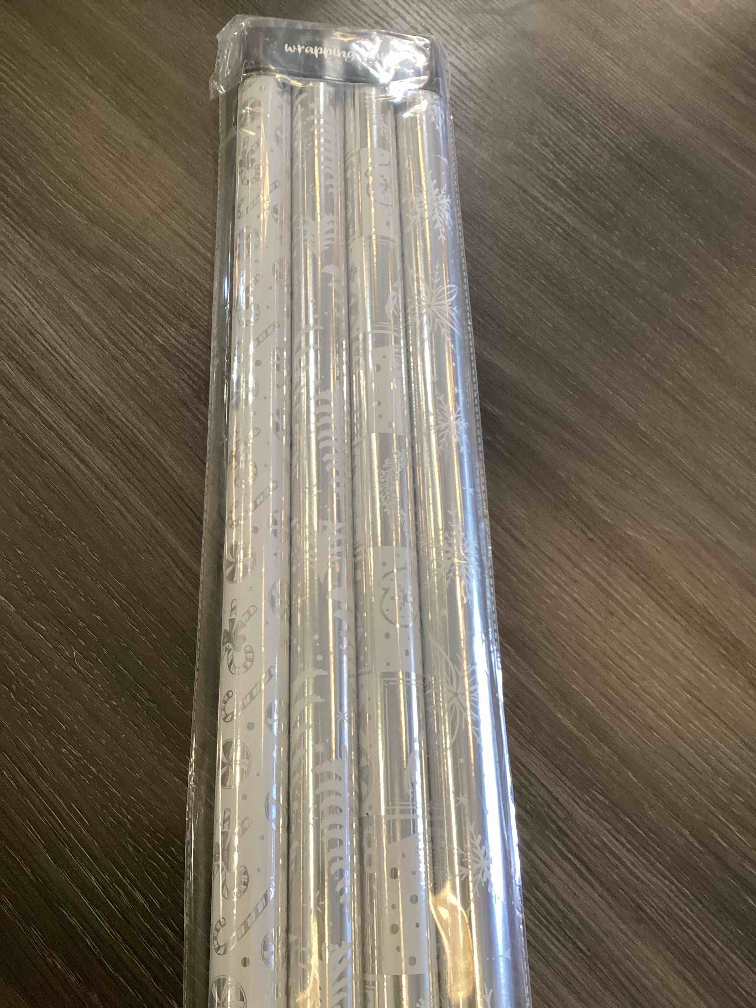 Condition photo showing Good Condition for MAYPLUSS Christmas Wrapping Paper Jumbo Rolls with Gridlines - 30IN X 120IN - 4 Roll - Christmas Tree Snowflakes Candy Cane for New Year Holiday Party Kids Silver Snow X 4