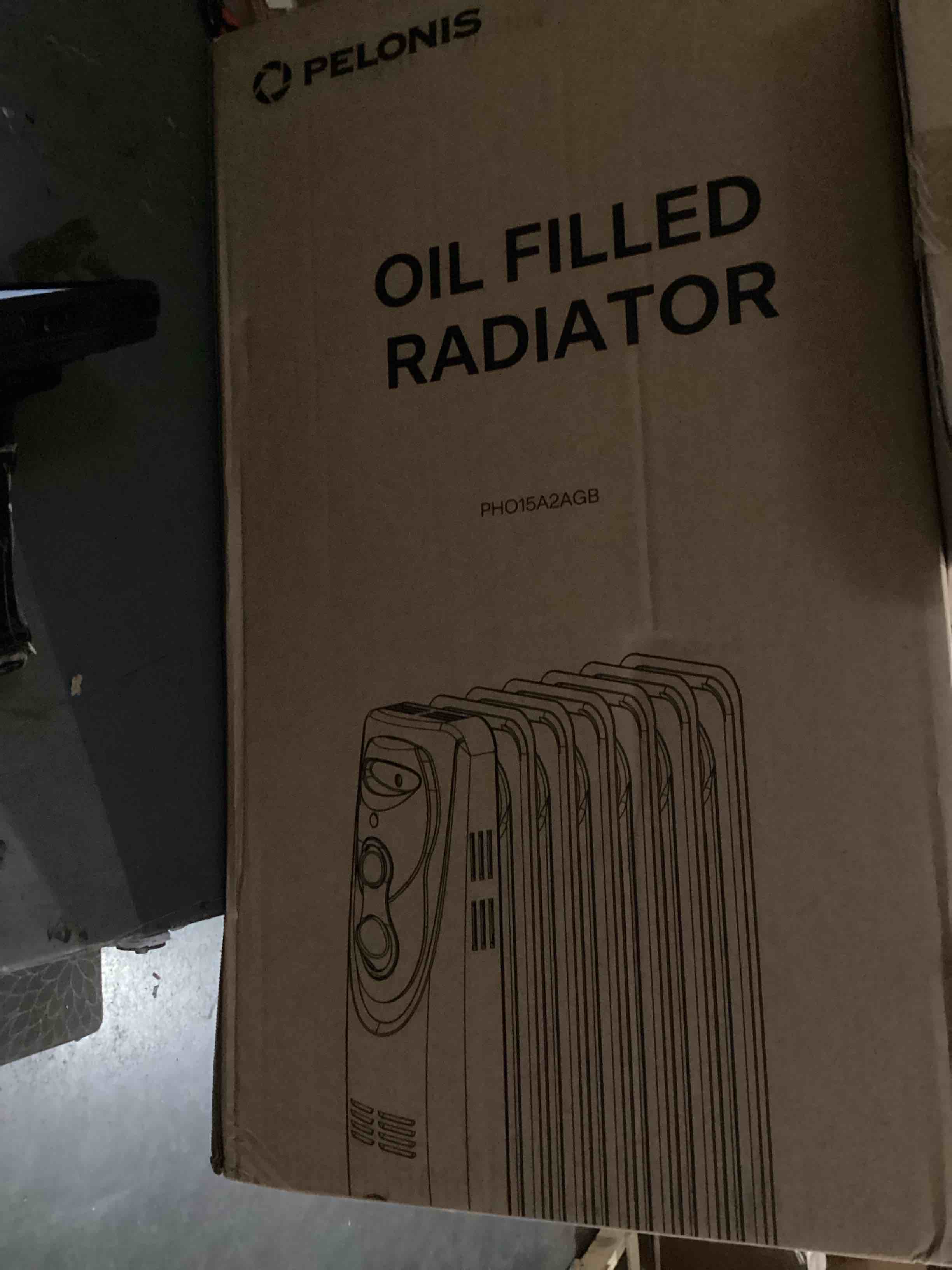 Condition photo showing As Is for PELONIS Radiator Heater for Large Space, Electric Oil Filled Radiator, Dual Knobs, 1500W, Quiet Space Heater, 3 Modes, Tip-over Protection Classic Black