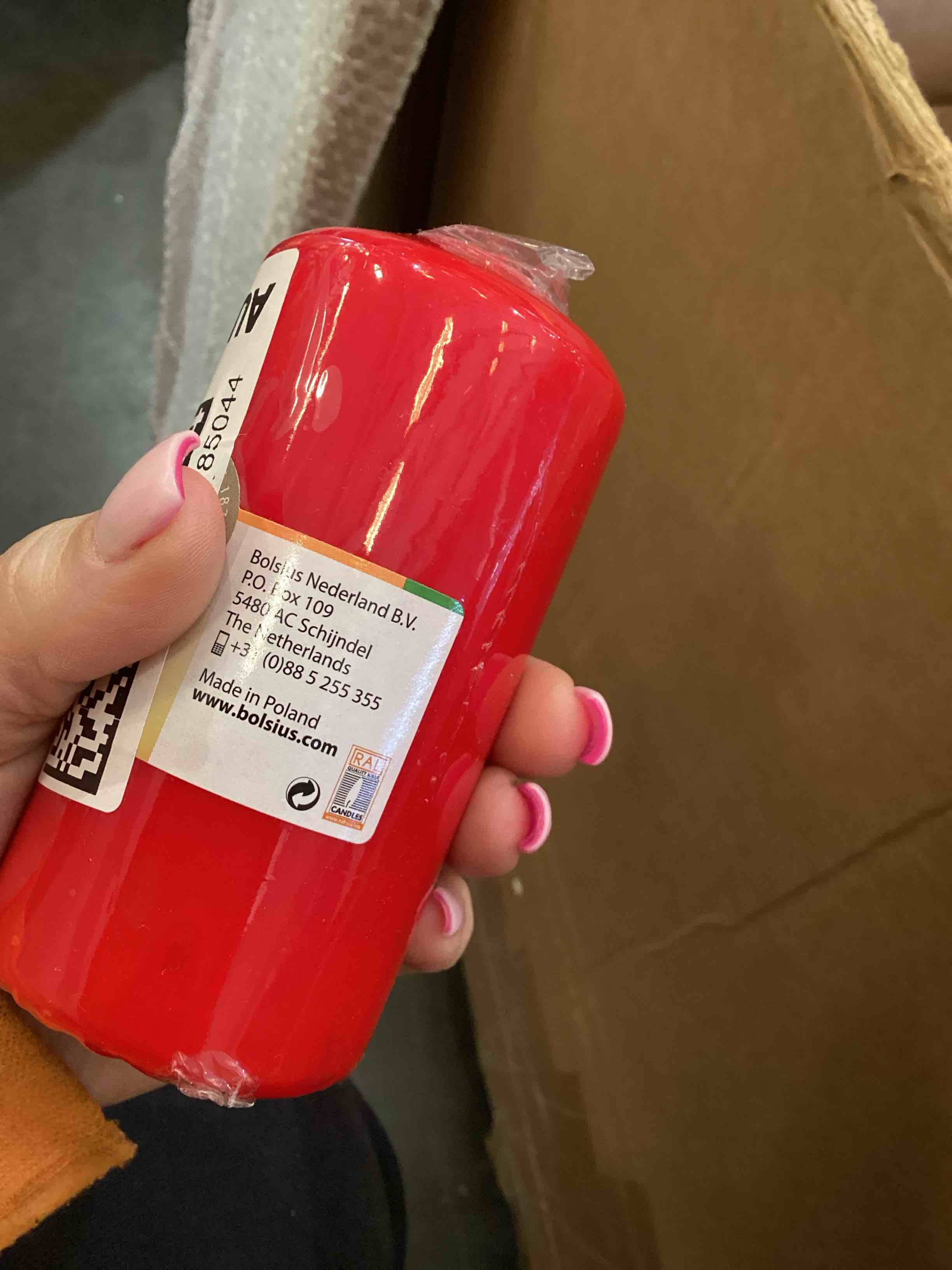 Condition photo showing As Is for red pillar candle