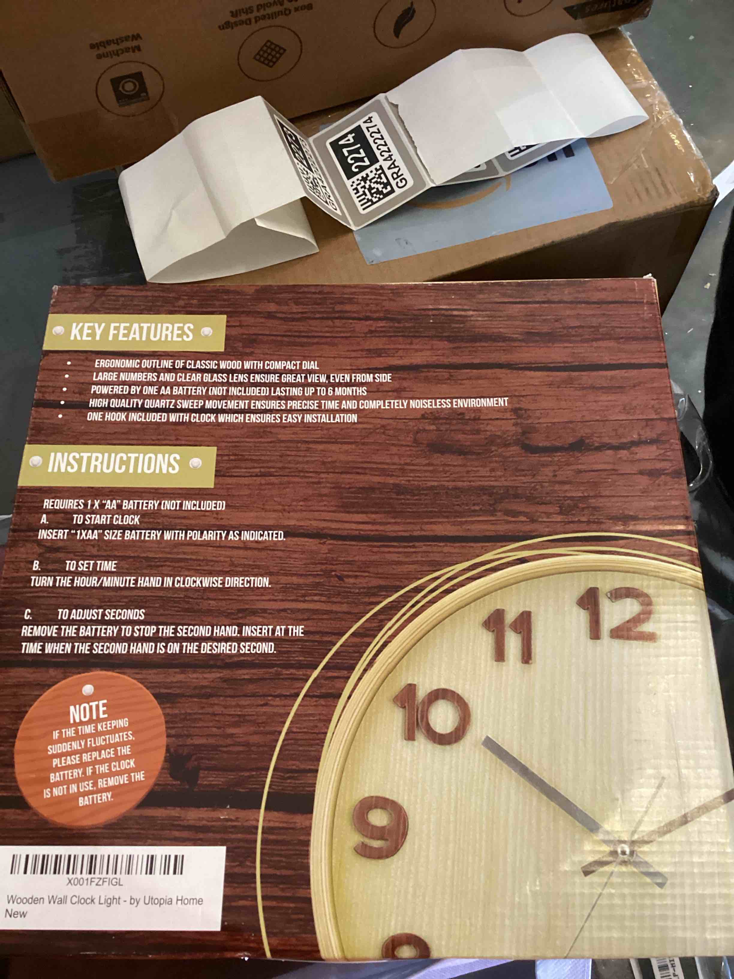 Condition photo showing As Is for Utopia Home wooden wall clock light