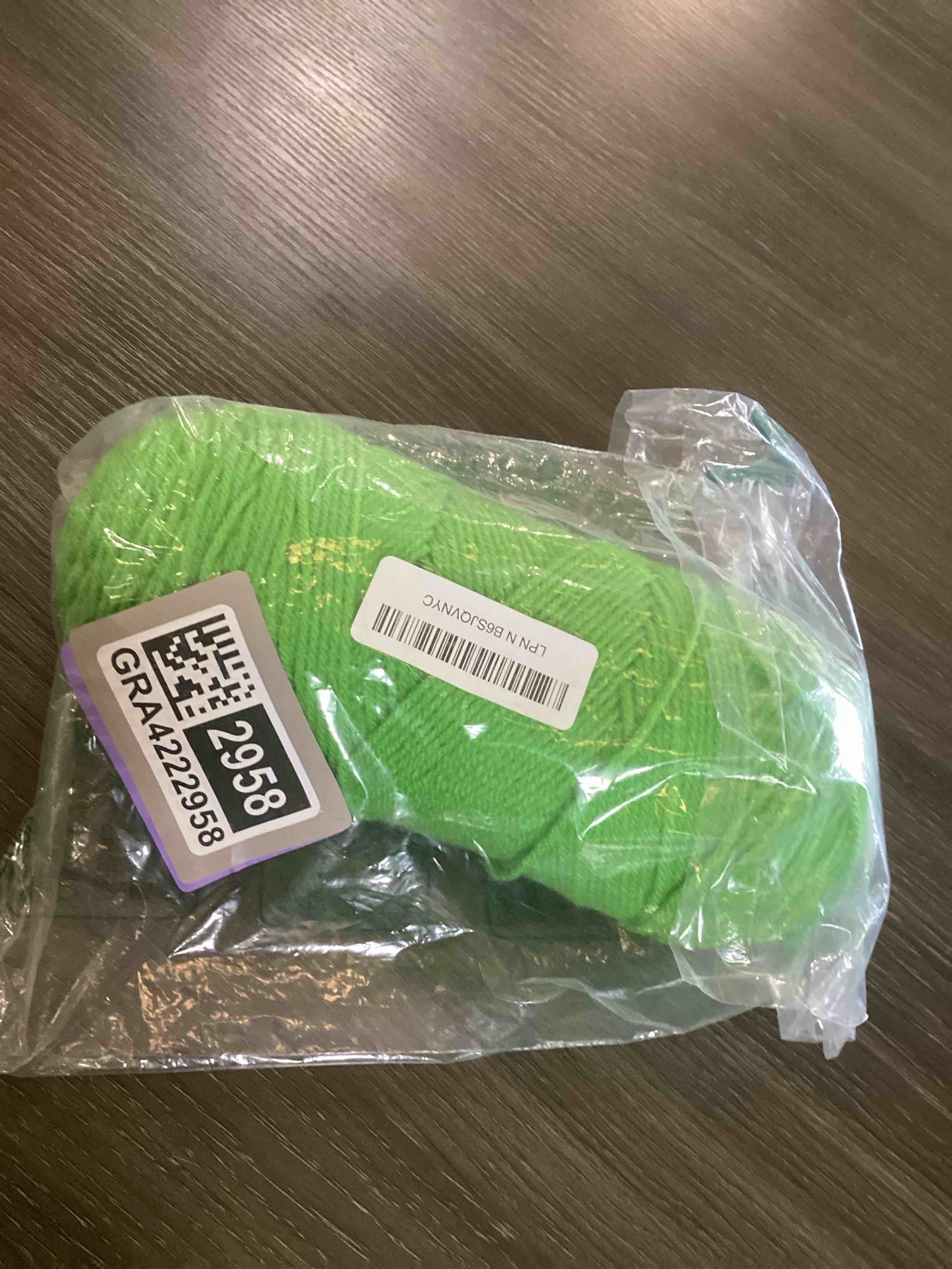 Condition photo showing As Is for green yarn