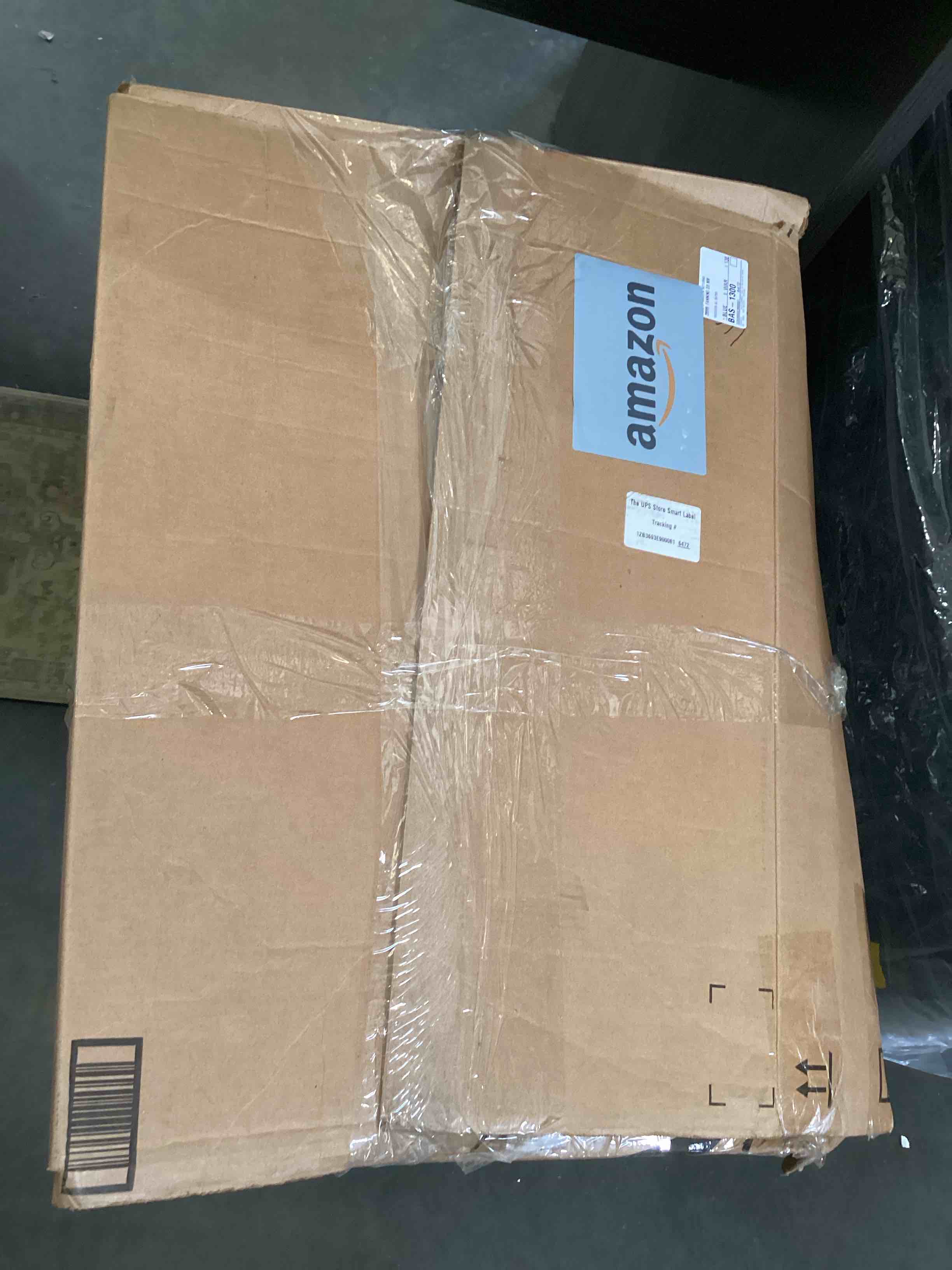Condition photo showing As Is for black area rug