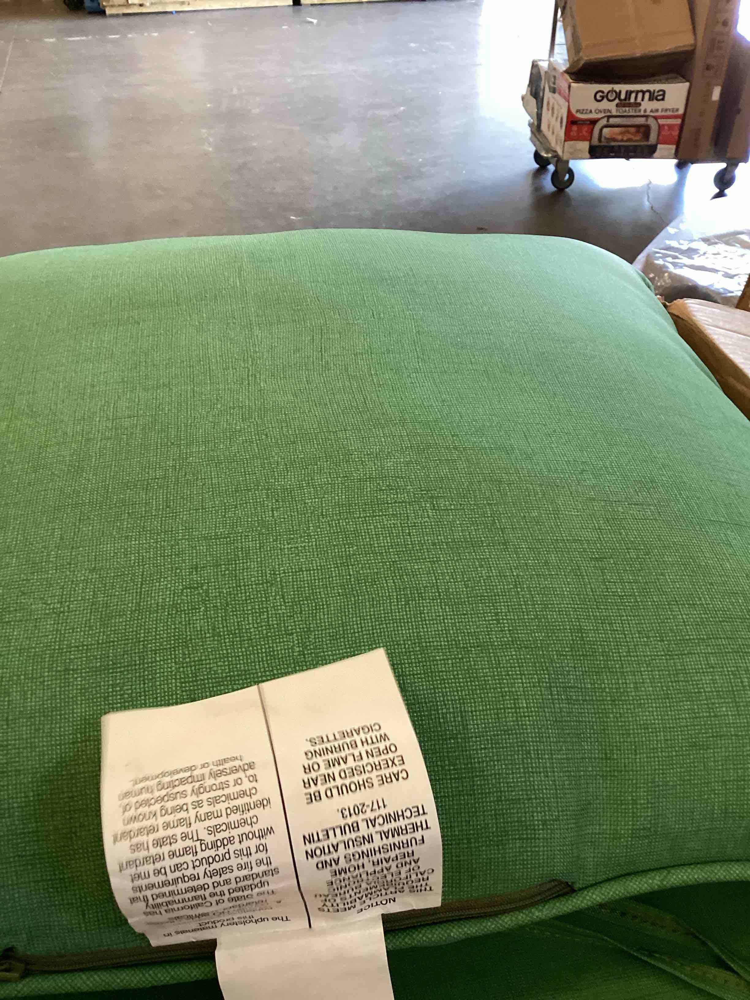 Condition photo showing As Is for arden outdoor deep seat cushion set (2-pack), 24 in x 24 in, weather-proof, rain-proof, fade resistant patio cushion for chair, sofa, and couch bright moss green leala polyfill bright  green leala 2 pack