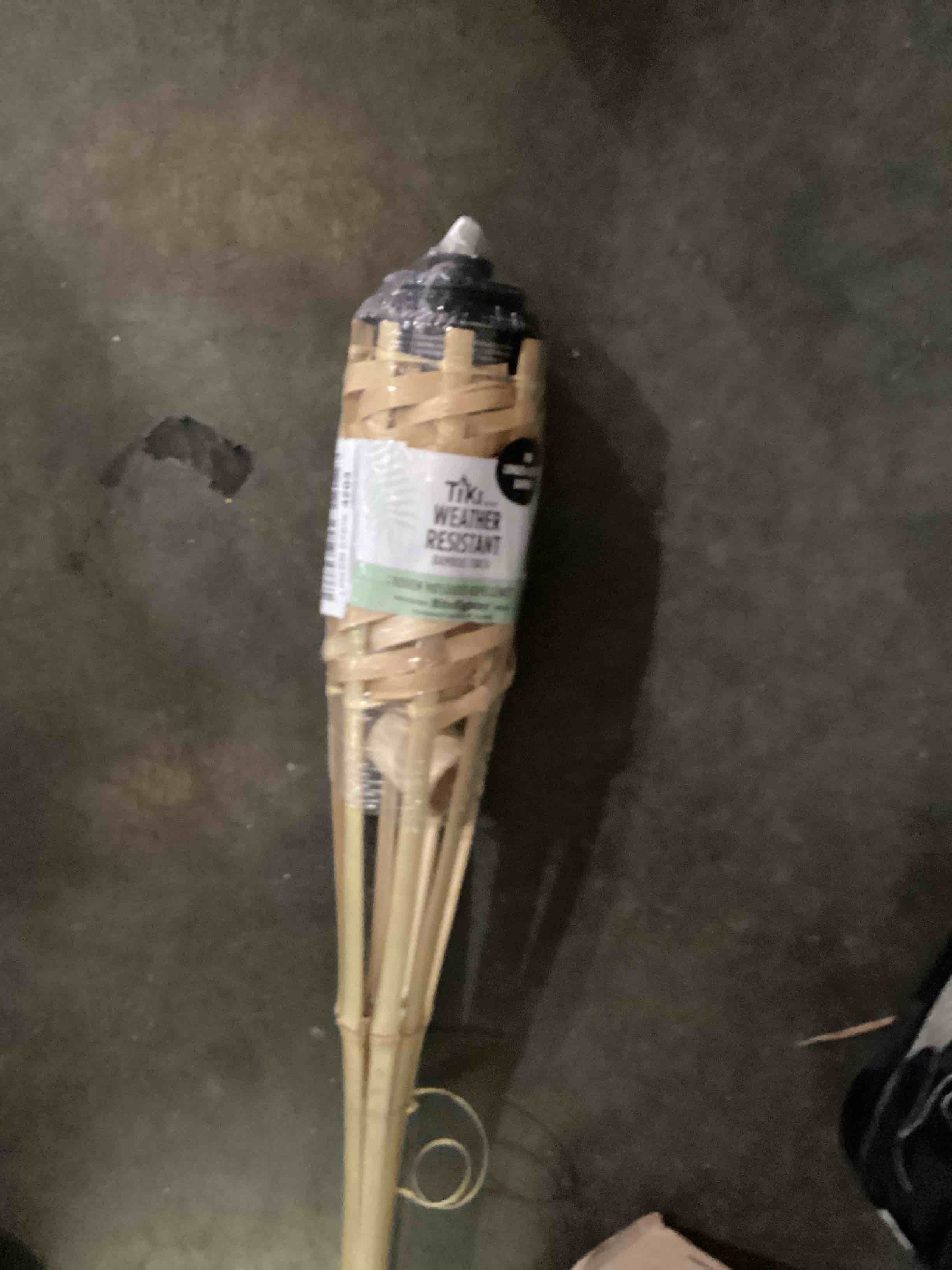 Condition photo showing As Is for tiki weather resistant bamboo torch