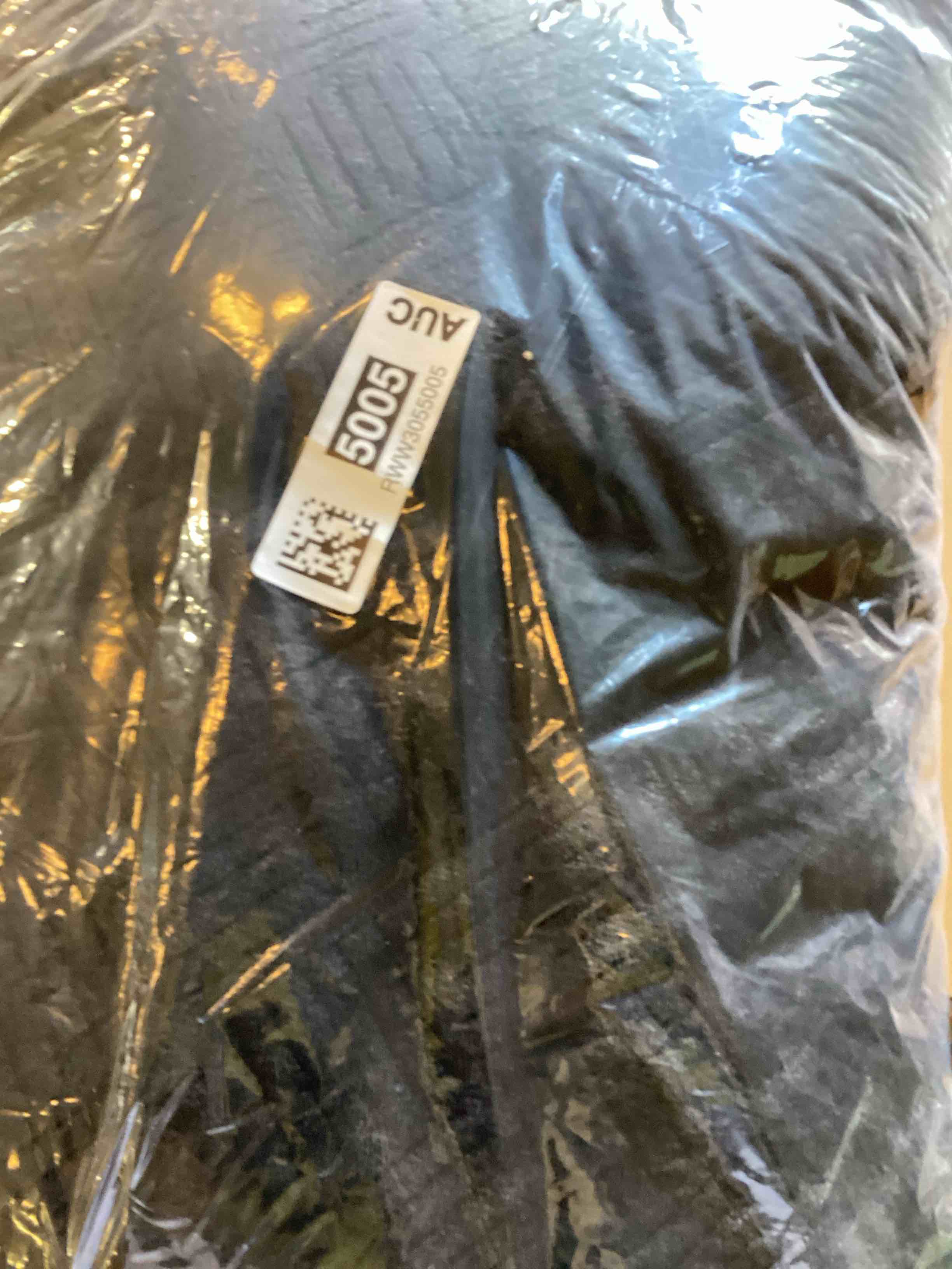 Condition photo showing As Is for black blanket 