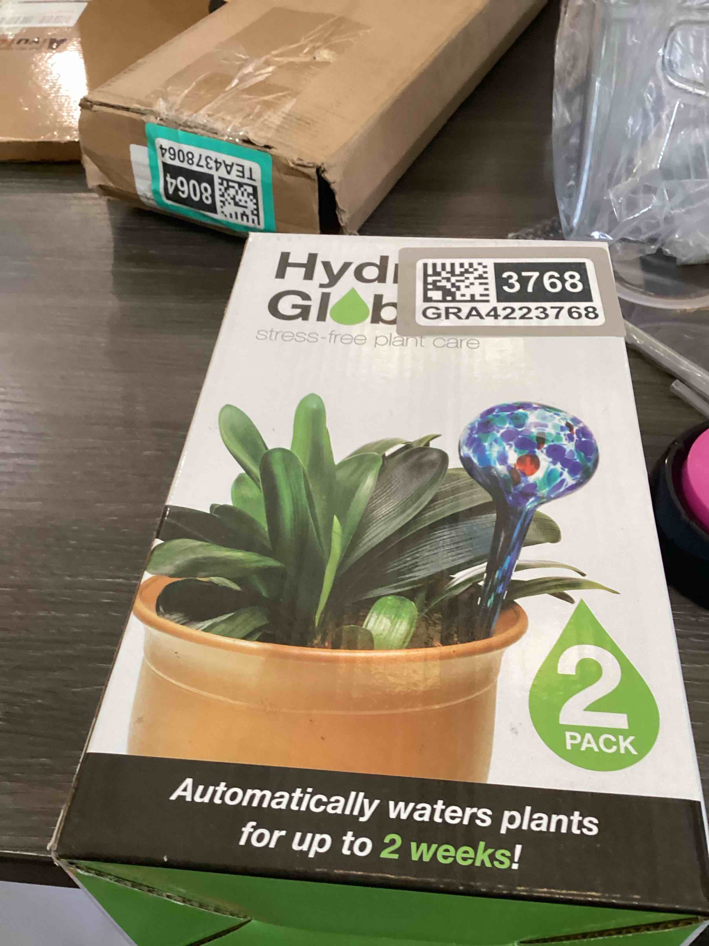 Condition photo showing As Is for gardening solutions hydro globes mini automatic watering bulbs, 2 piece deluxe set