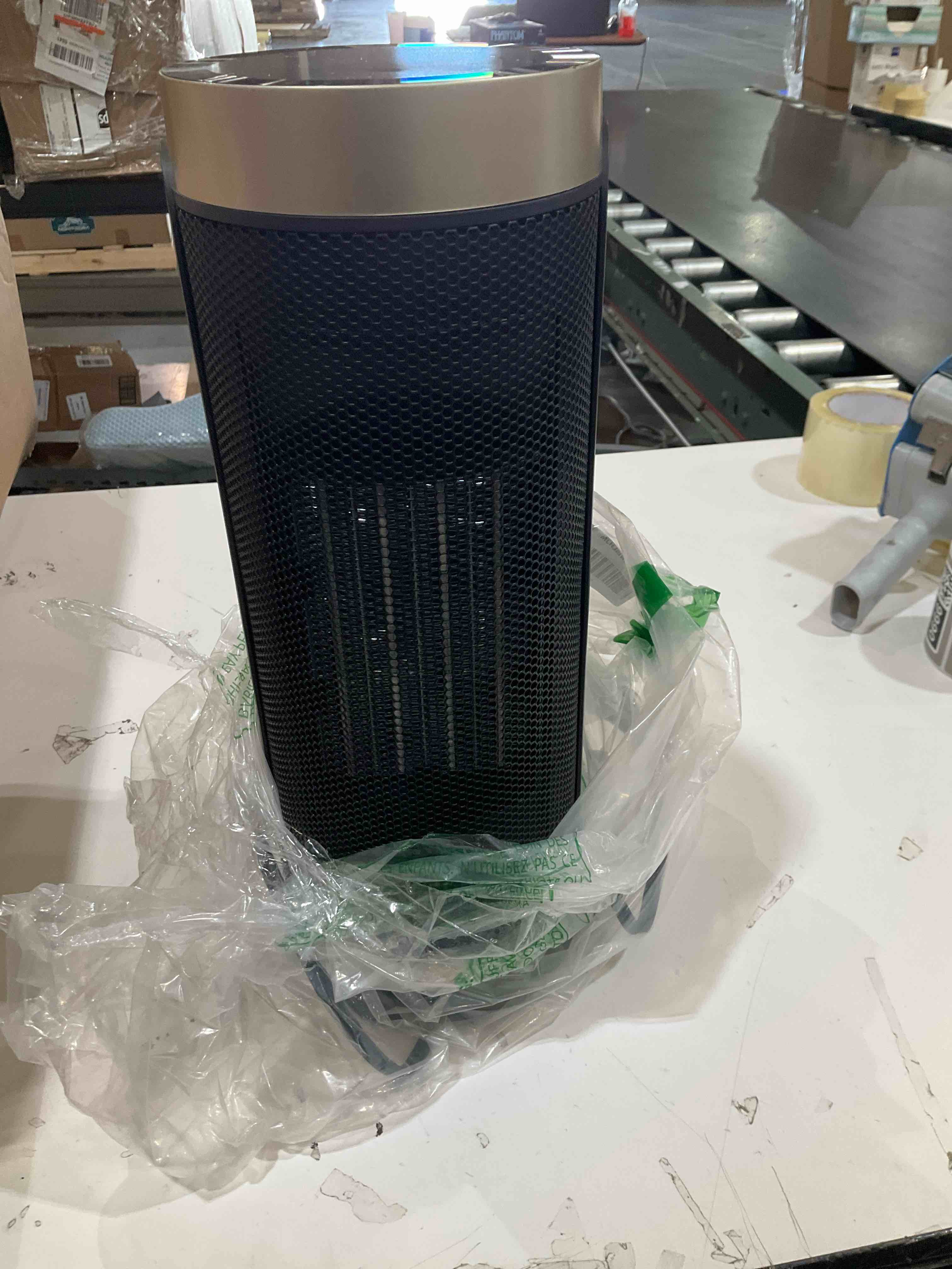 Condition photo showing As Is for overview +1 this item is a dreo tower heater, likely the 30-inch ceramic mode