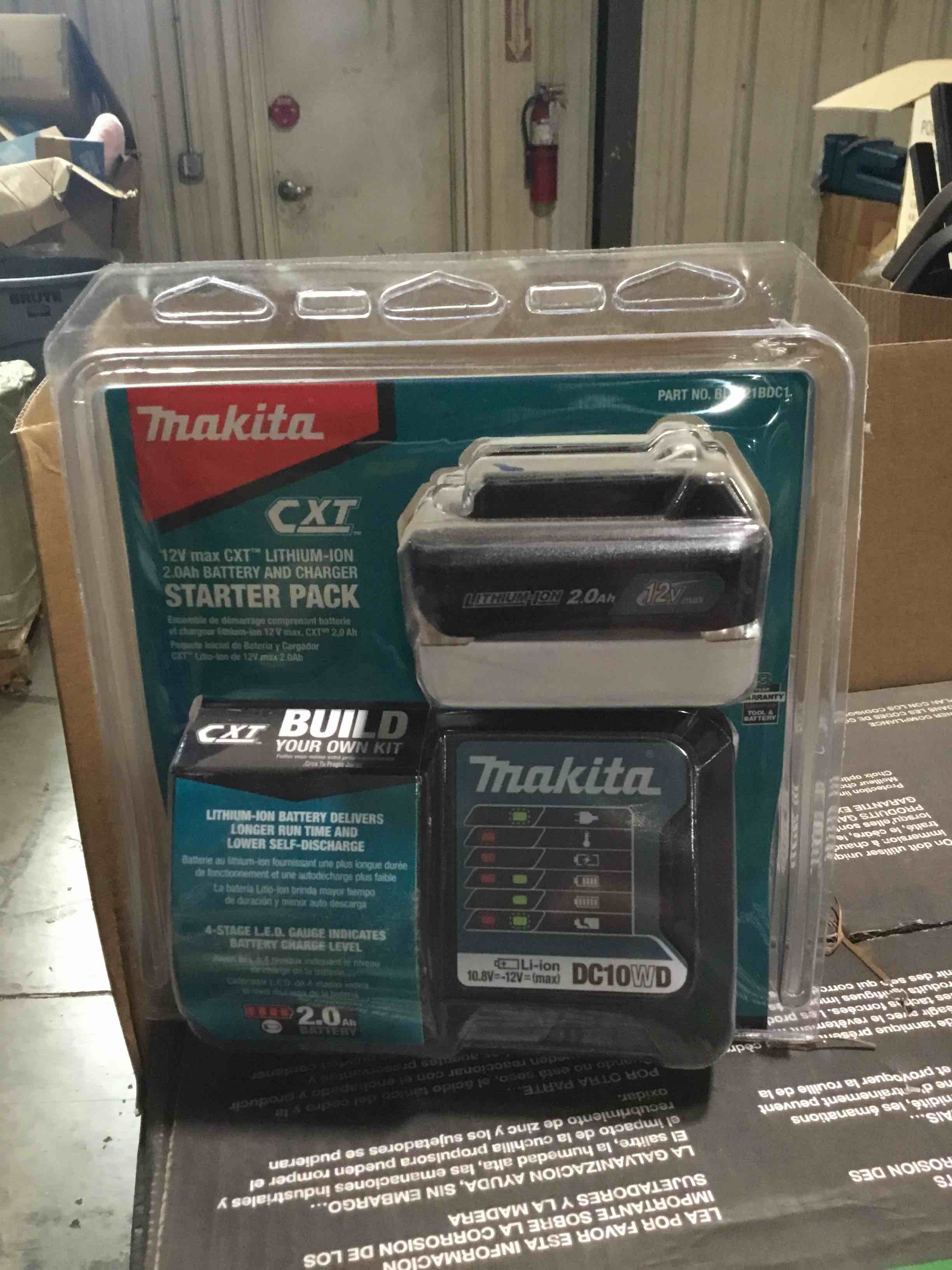 Condition photo showing Brand New for makita bl1021bdc1 12v max cxt lithium-ion battery and charger starter pack
