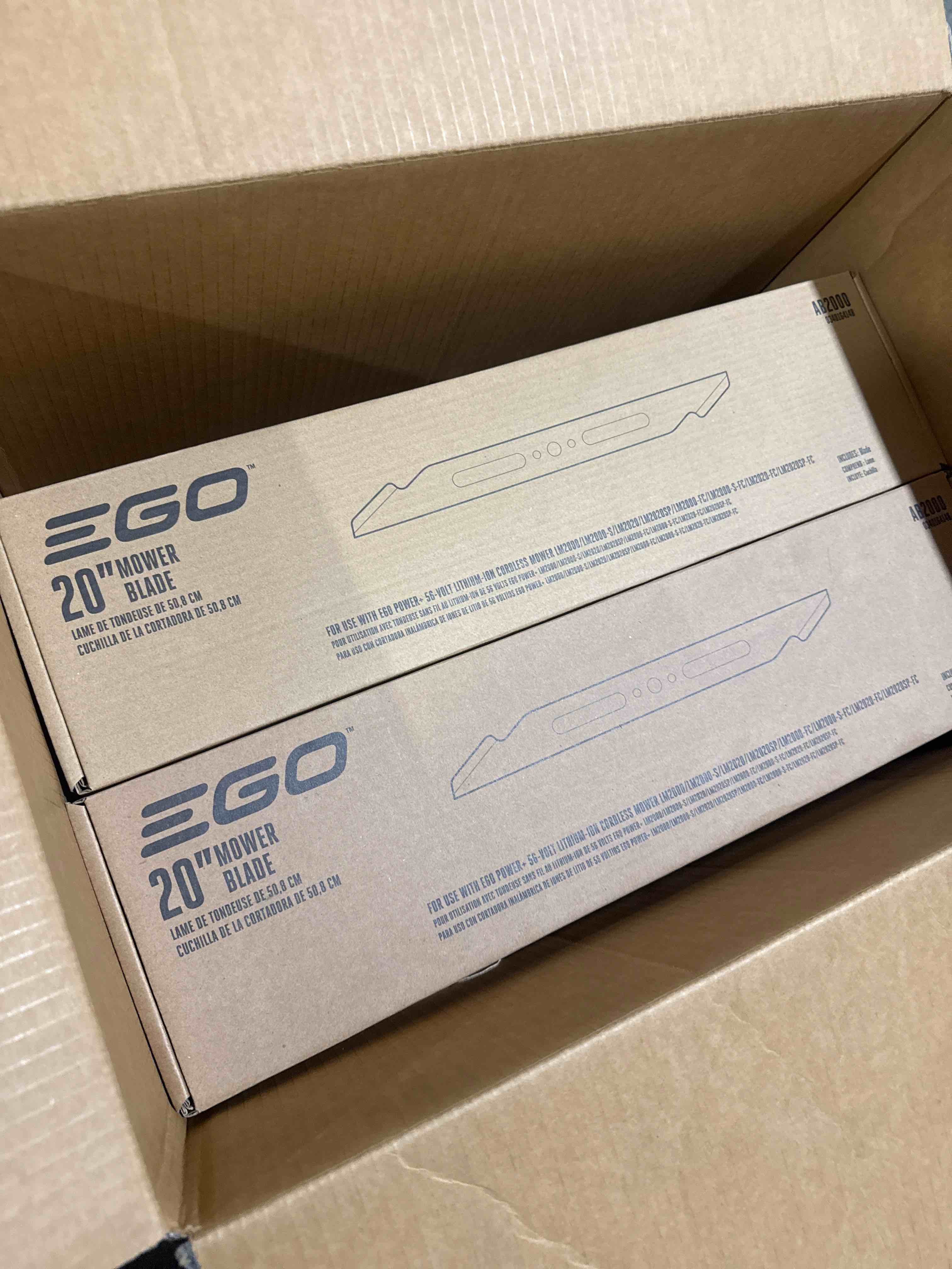 a lot of 10 20” ego mower blade 