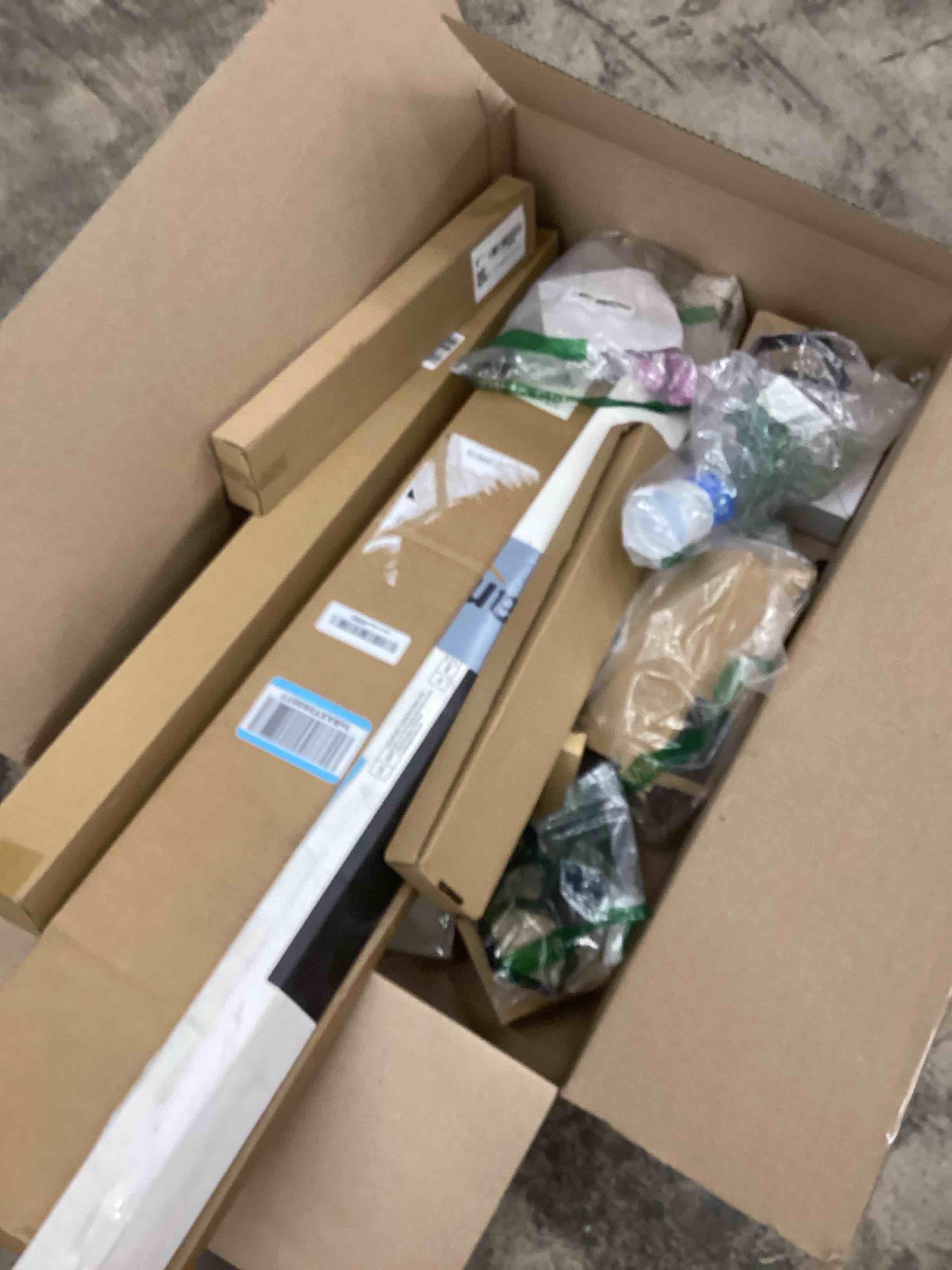 assorted of items for home repairs included : blind/remote control/ tube/wreath hangers/ and more 