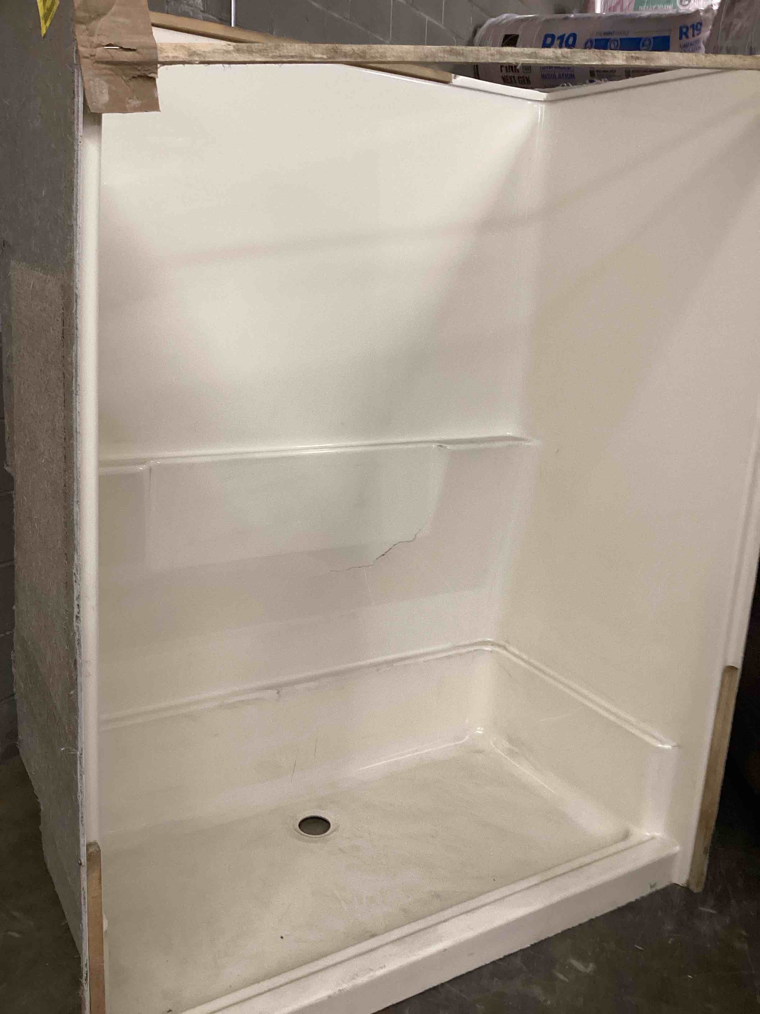 Condition photo showing As Is for RE6035SD-BC - CLARION CONVERTIBLE SHOWER BISCUIT 60 X 35 CENTER DRAIN 4IN THRESHOLD FIBERGLASS