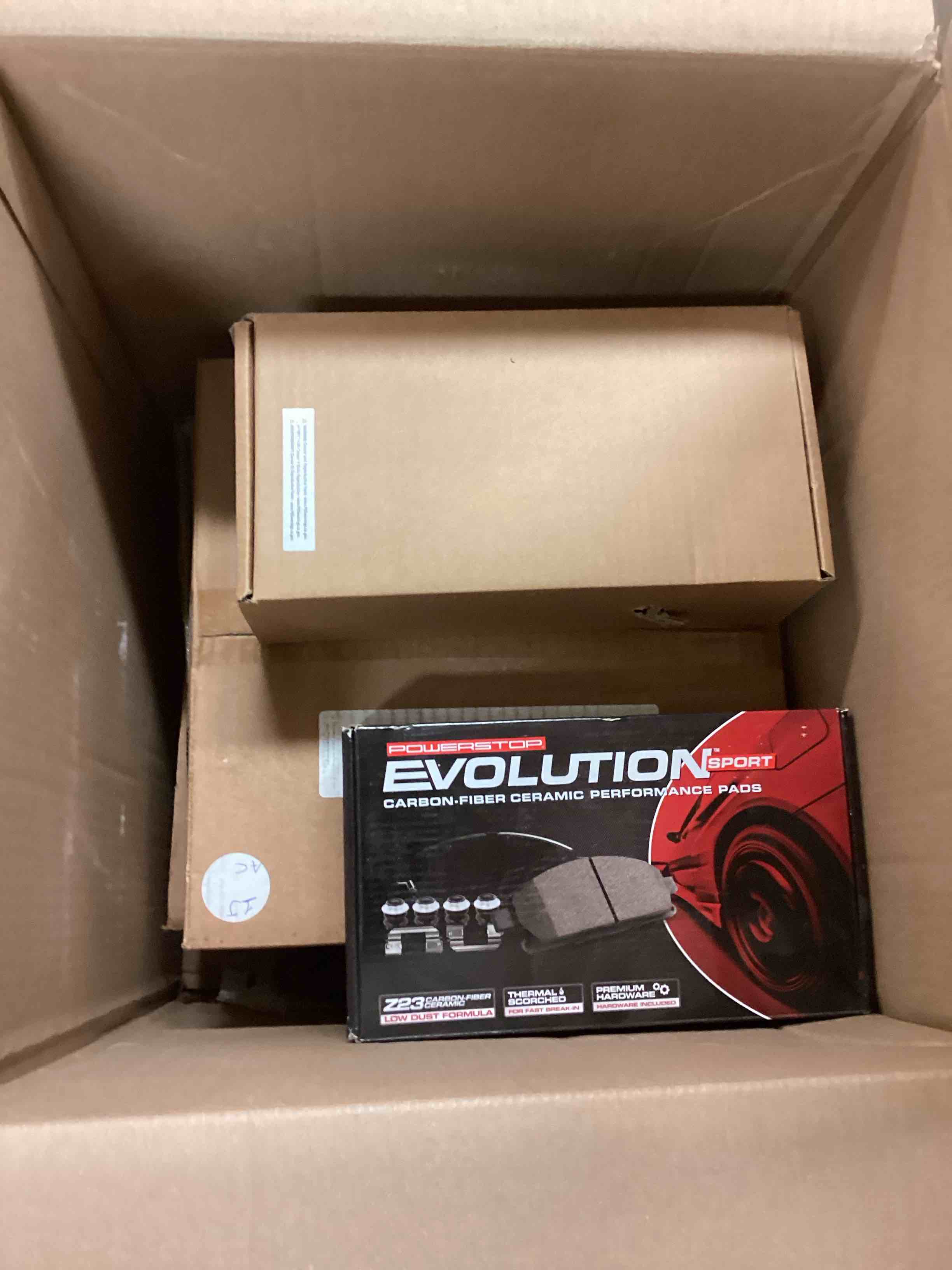 Condition photo showing item condition for Power Stop K6145 Front and Rear Z23 Carbon Fiber Brake Pads with Drilled & Slotted Brake Rotors Kit For BMW X6 2008-2009 [Model Specific]