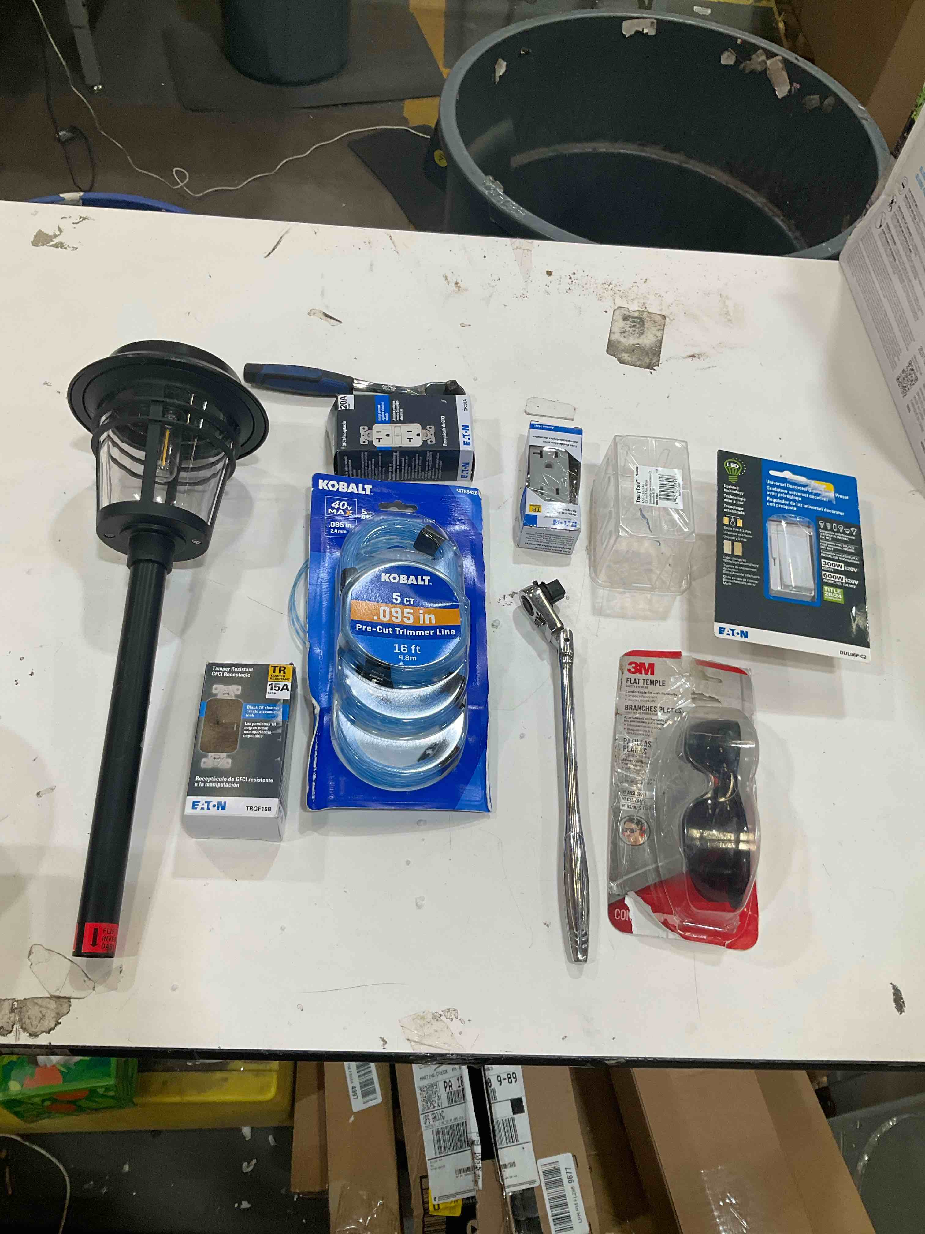 Condition photo showing As Is for assorted home improvement lot (small tools, screw, home accessories, etc.)