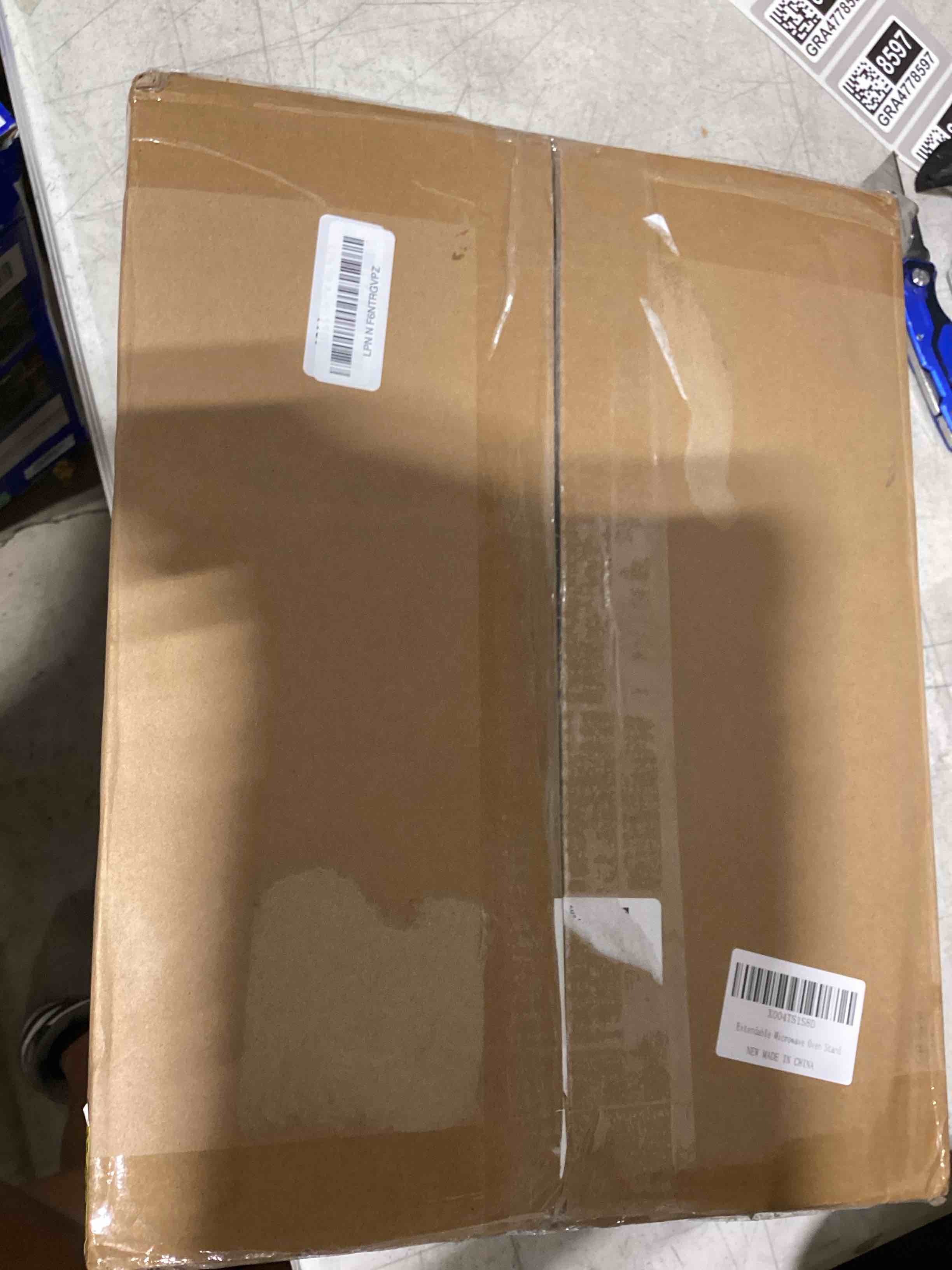 Condition photo showing As Is for extendable microwave oven stand