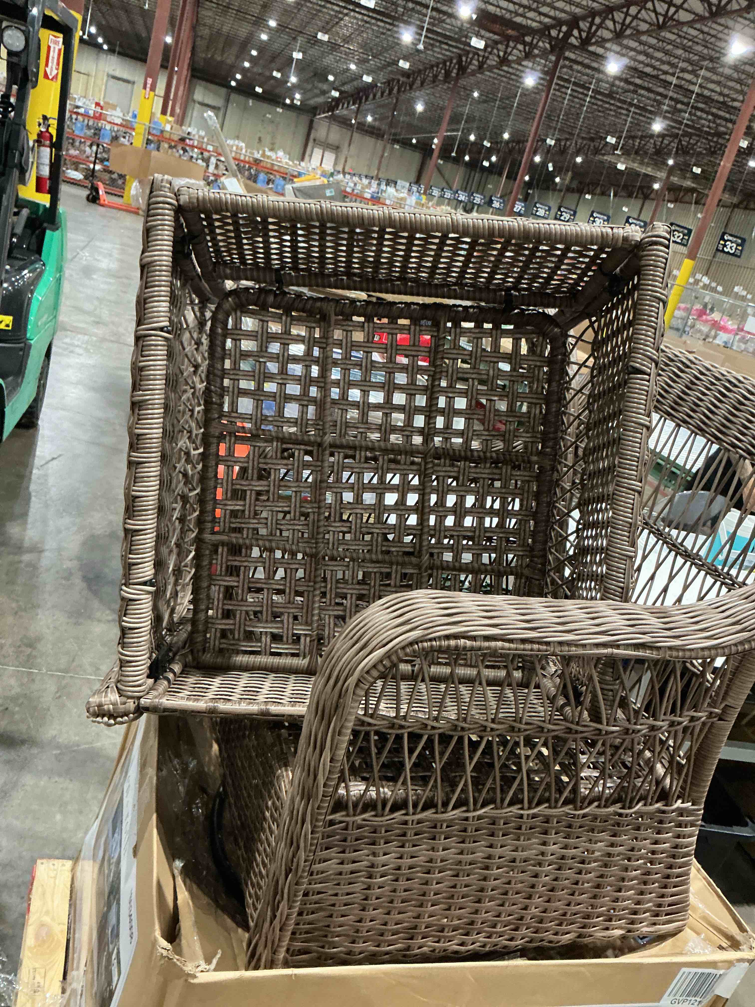 Condition photo showing As Is for allen + roth grand haven 2-piece set, featuring all-weather wicker, a warm wood-look finish, powder-coated steel frames, and blue olefin fabric cushions.