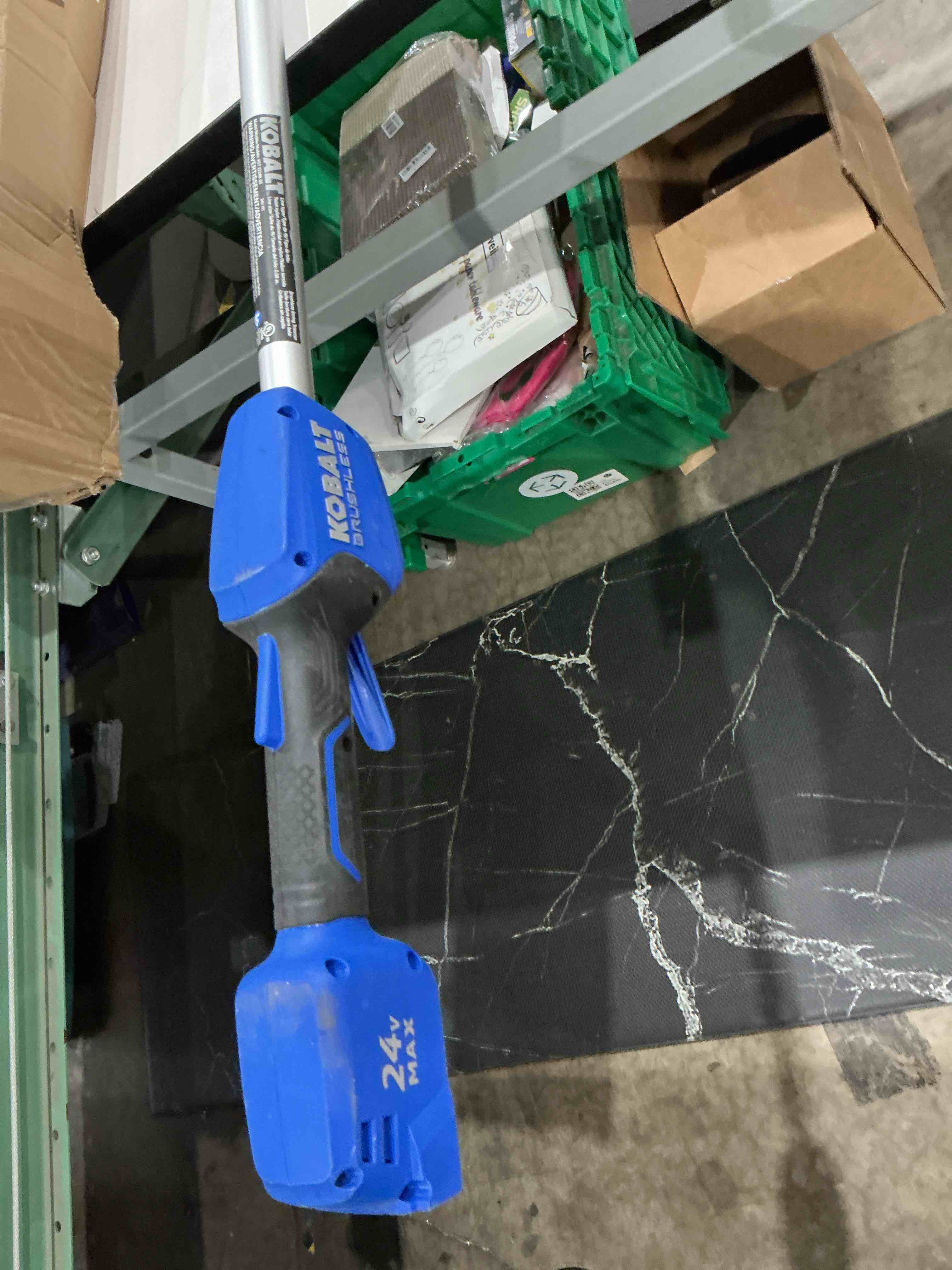 Condition photo showing As Is for kobalt 24-volt straight shaft battery string trimmer, no battery.