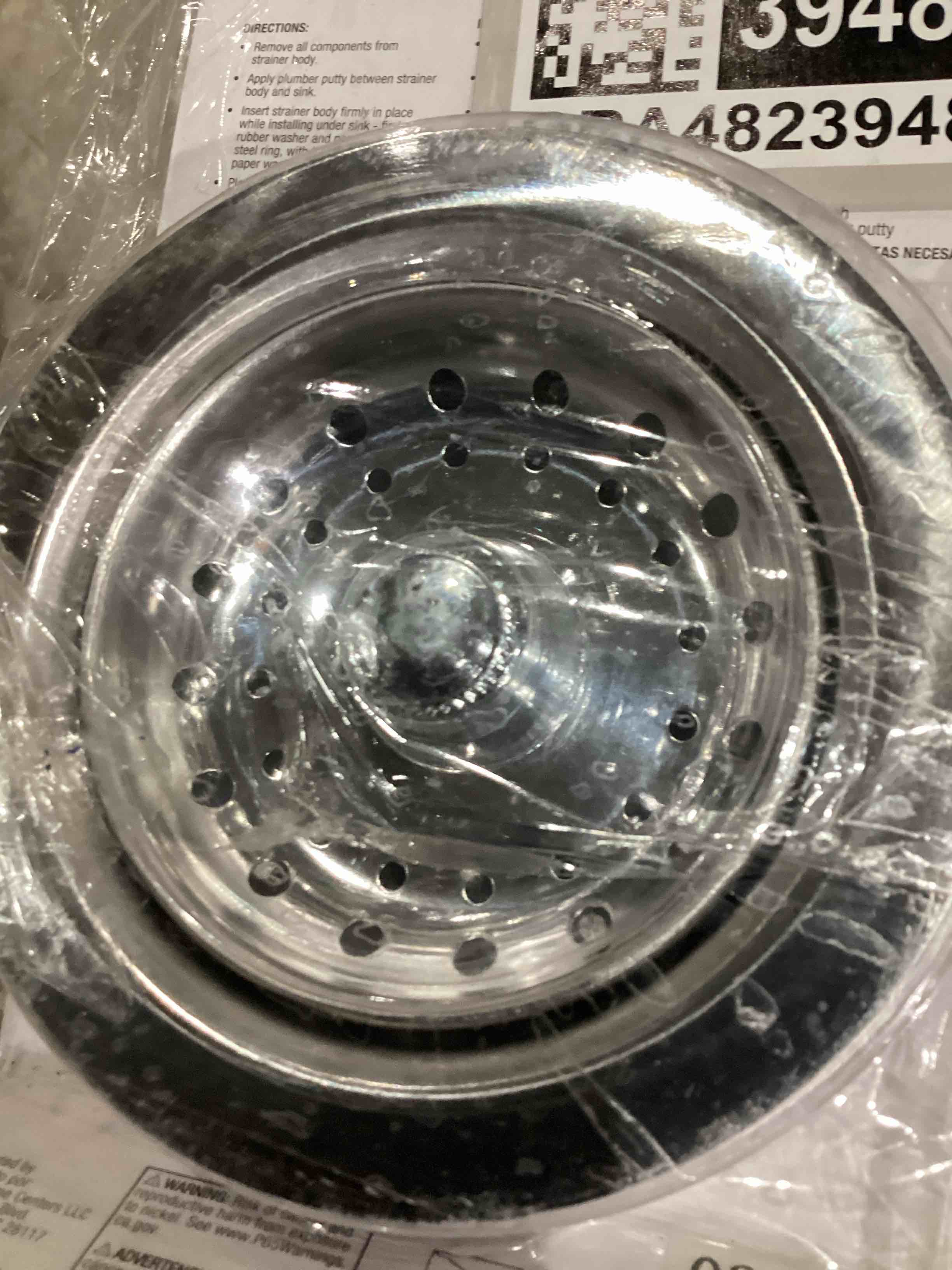 Condition photo showing As Is for sink strainer with fixed post basket, stainless steel