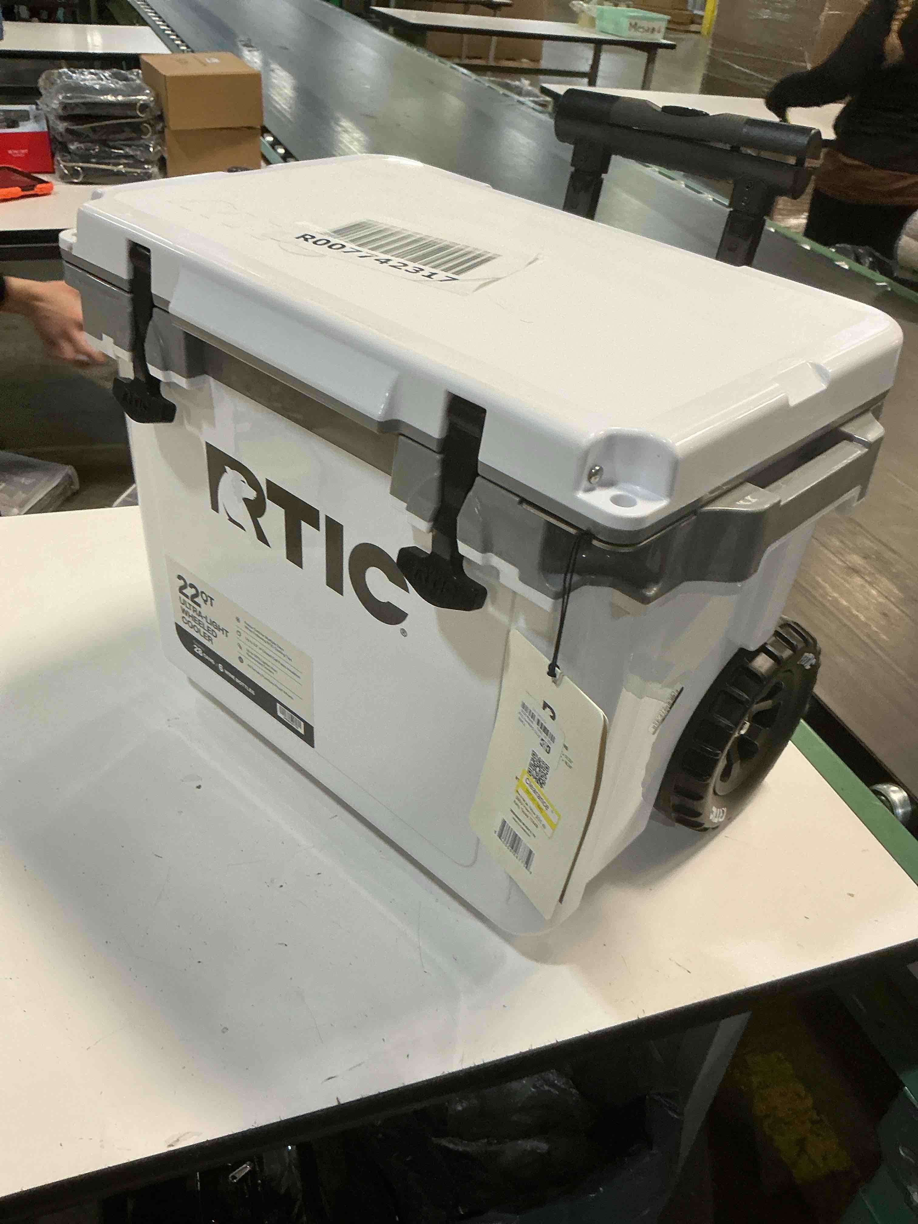 Condition photo showing As Is for rtic outdoors 22qt ultra light wheeled hard sided cooler - white: polypropylene construction