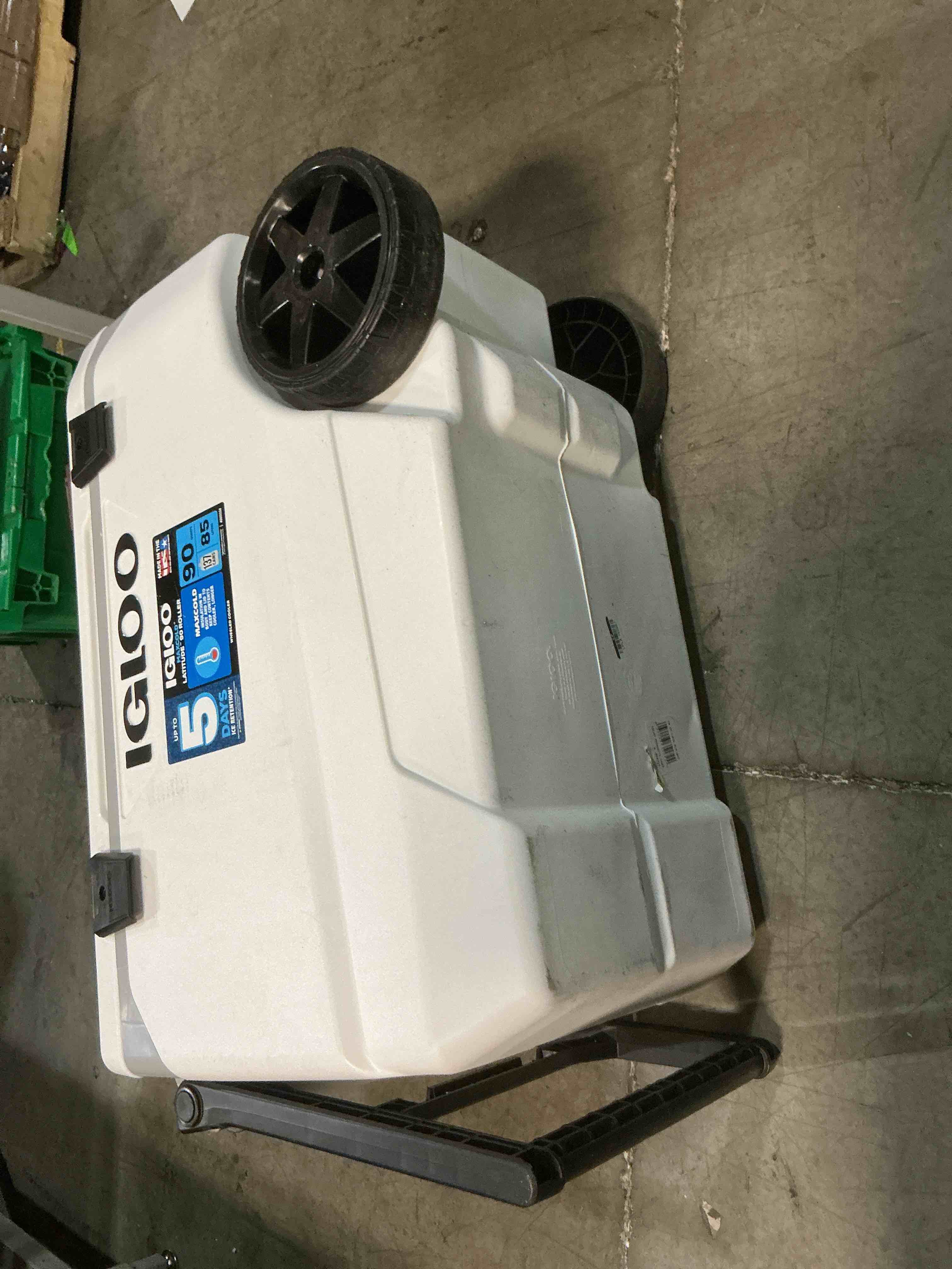 Condition photo showing As Is for igloo latitude 137 cans 90 quart rolling cooler - white: polyethylene, tow handle