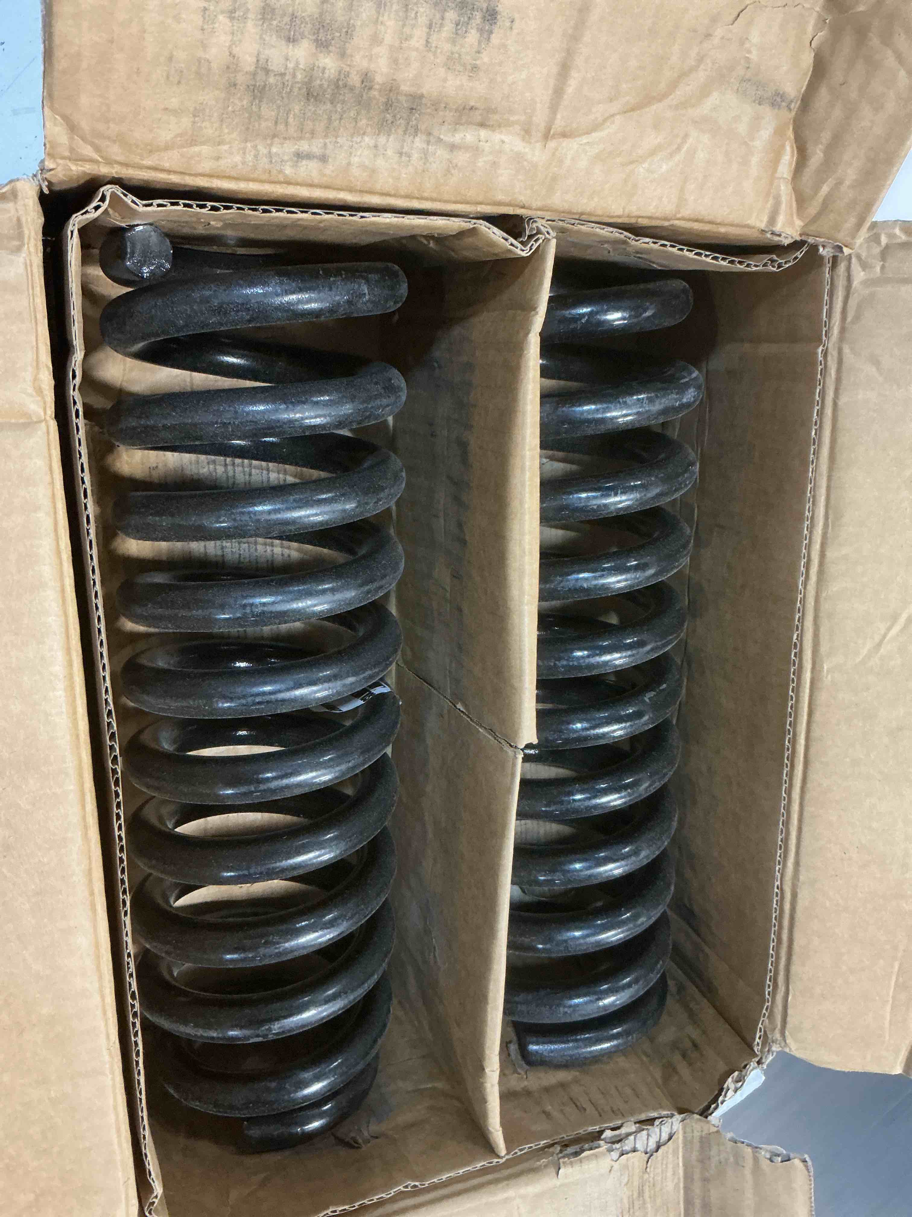 Condition photo showing New/Like New for moog 81092 coil spring set for toyota 4runner