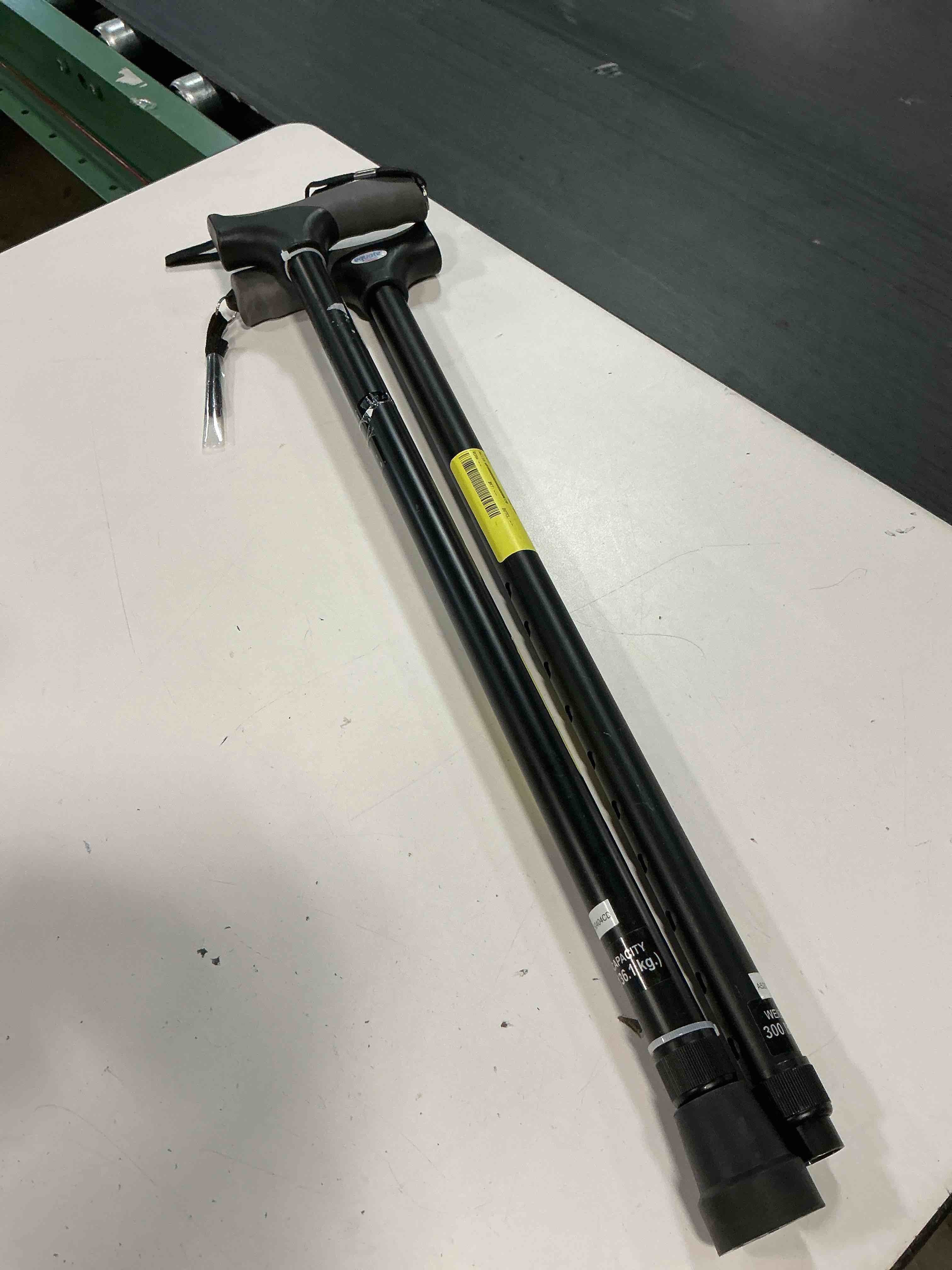 Condition photo showing As Is for equate mobility comfort grip walking cane, blue, height adjustable, 300 lb weight capacity(2 pack)