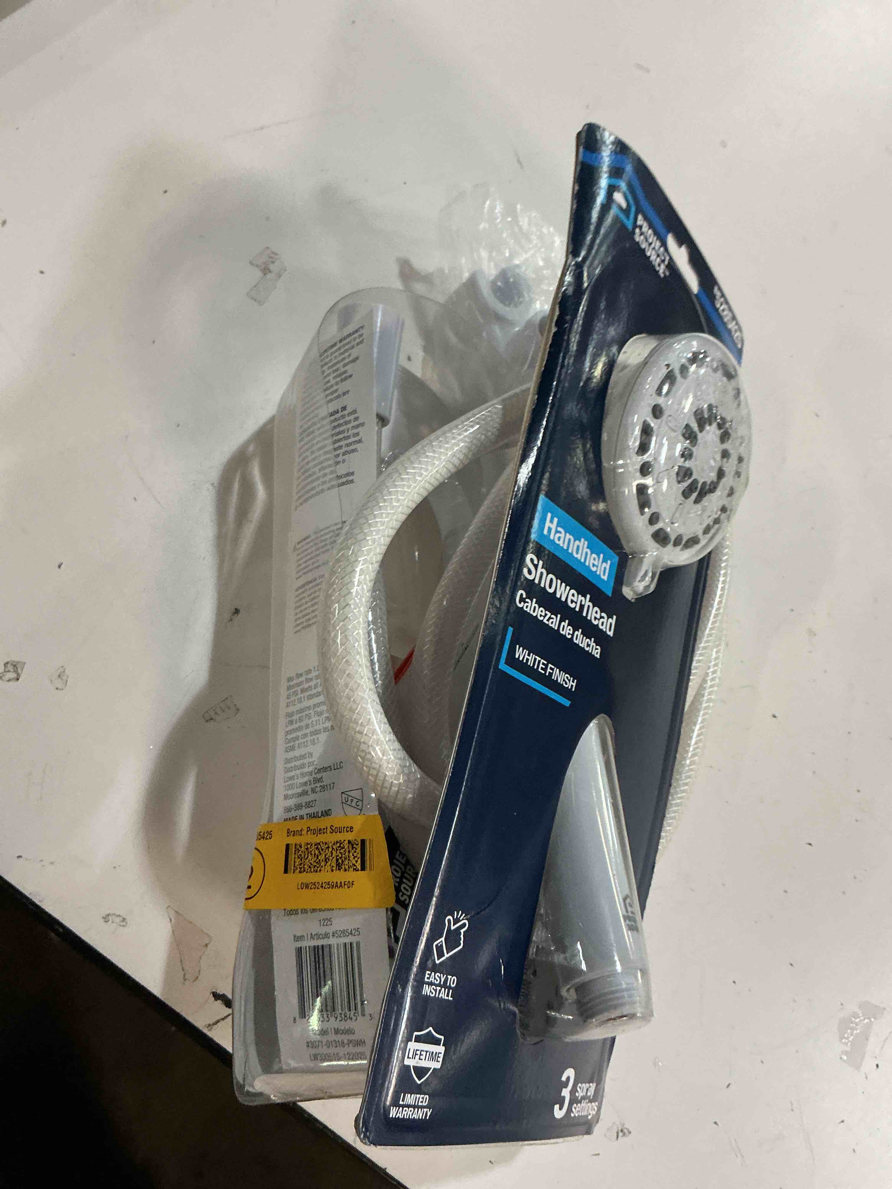 Condition photo showing As Is for project source round handheld shower head