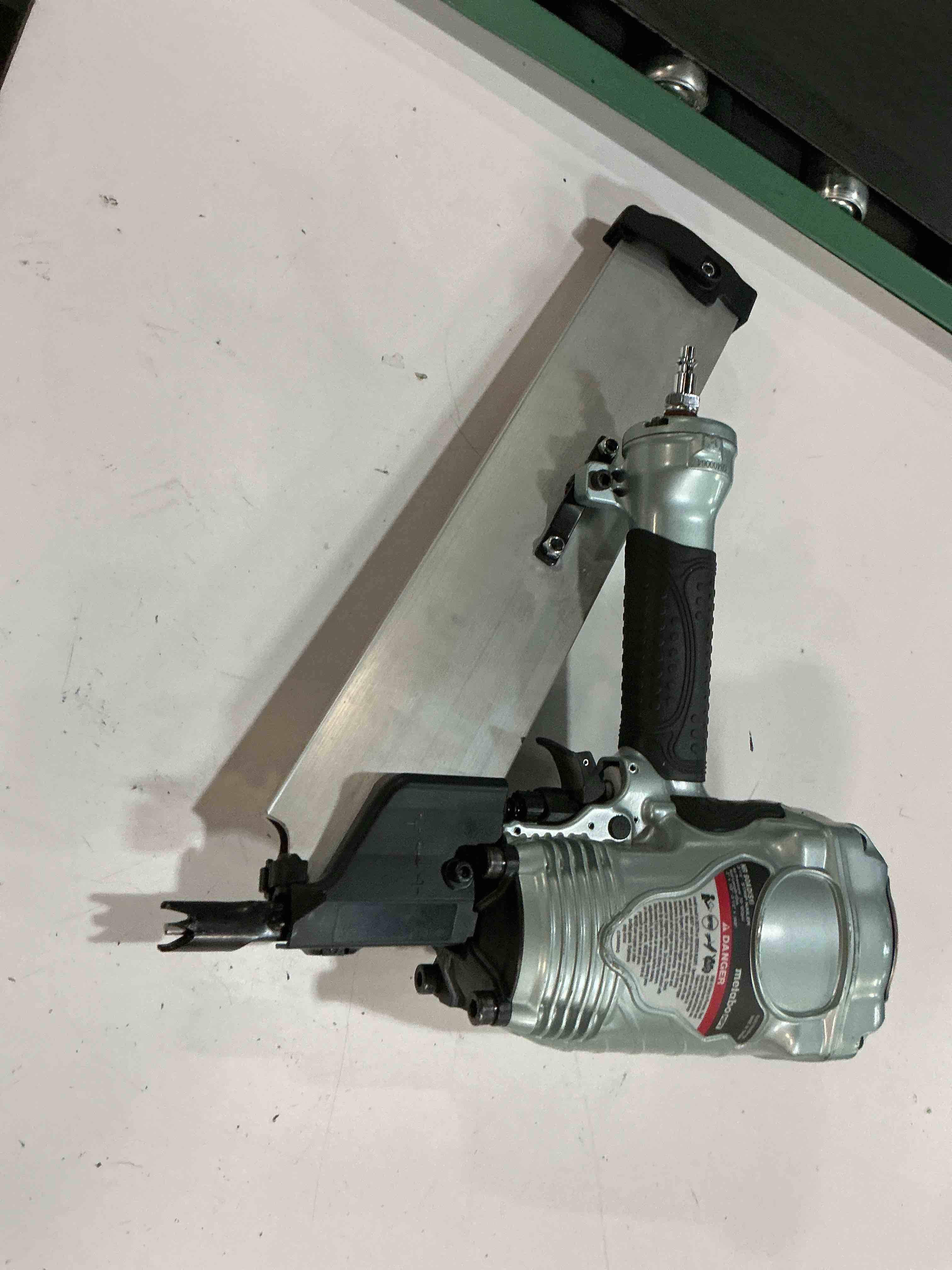 Condition photo showing As Is for metabo hpt 3-1/2-in 30 -degree pneumatic clip head/roundhead framing nailer